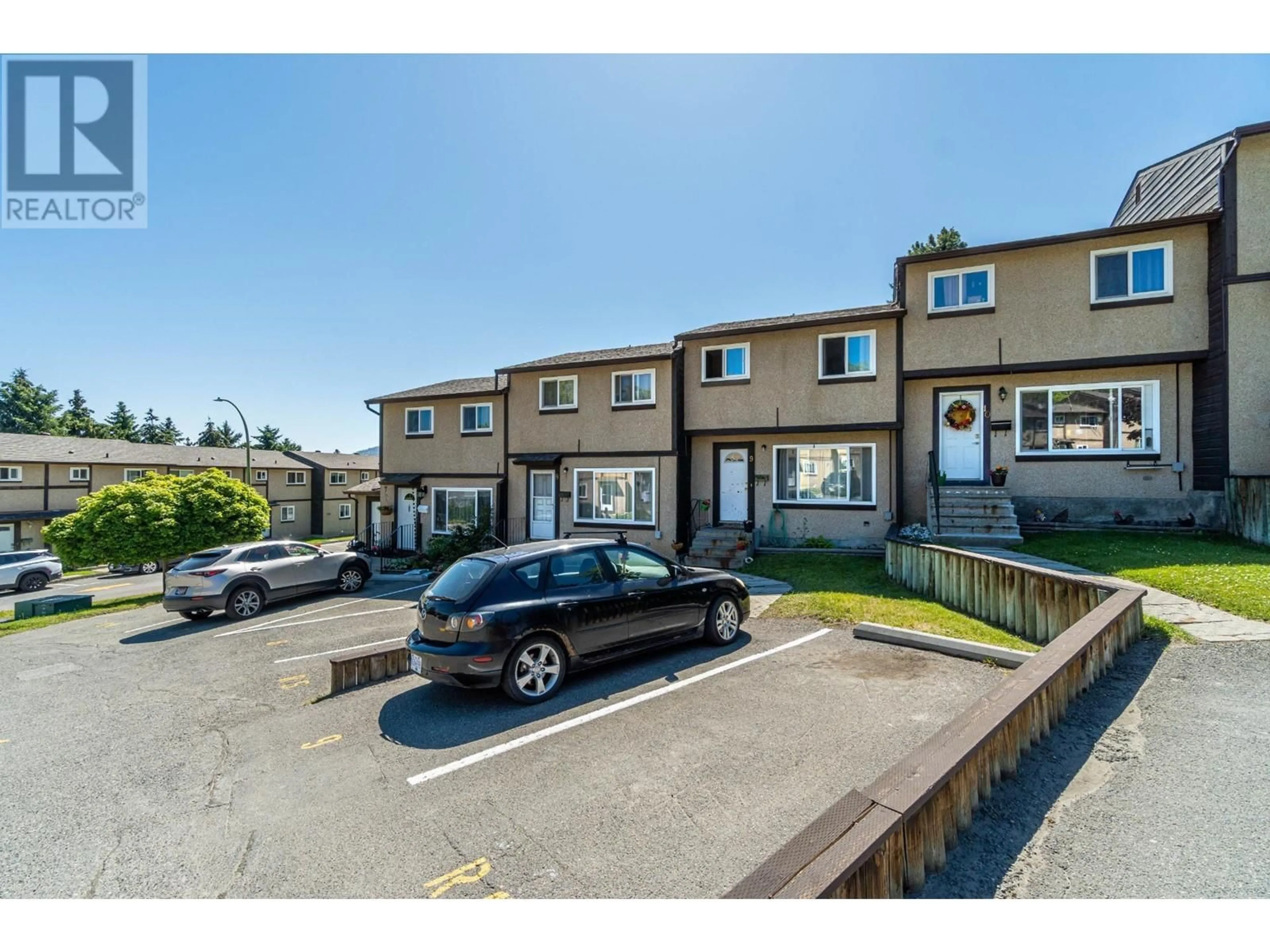 A pic from outside/outdoor area/front of a property/back of a property/a pic from drone, street for 1605 SUMMIT Drive Unit# 9, Kamloops British Columbia V2E2A5