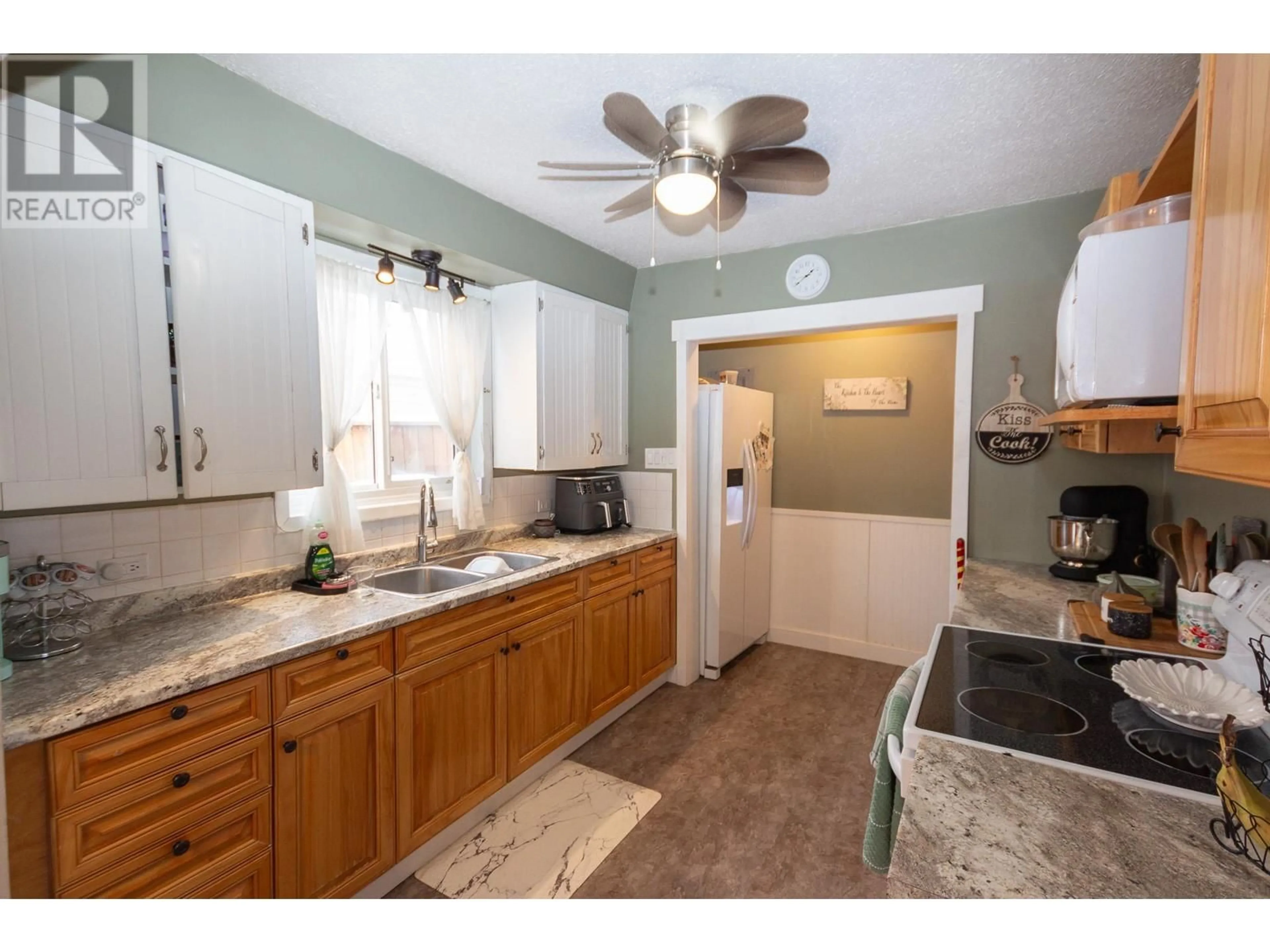 Standard kitchen, ceramic/tile floor for 300 100A Avenue, Dawson Creek British Columbia V1G1X4