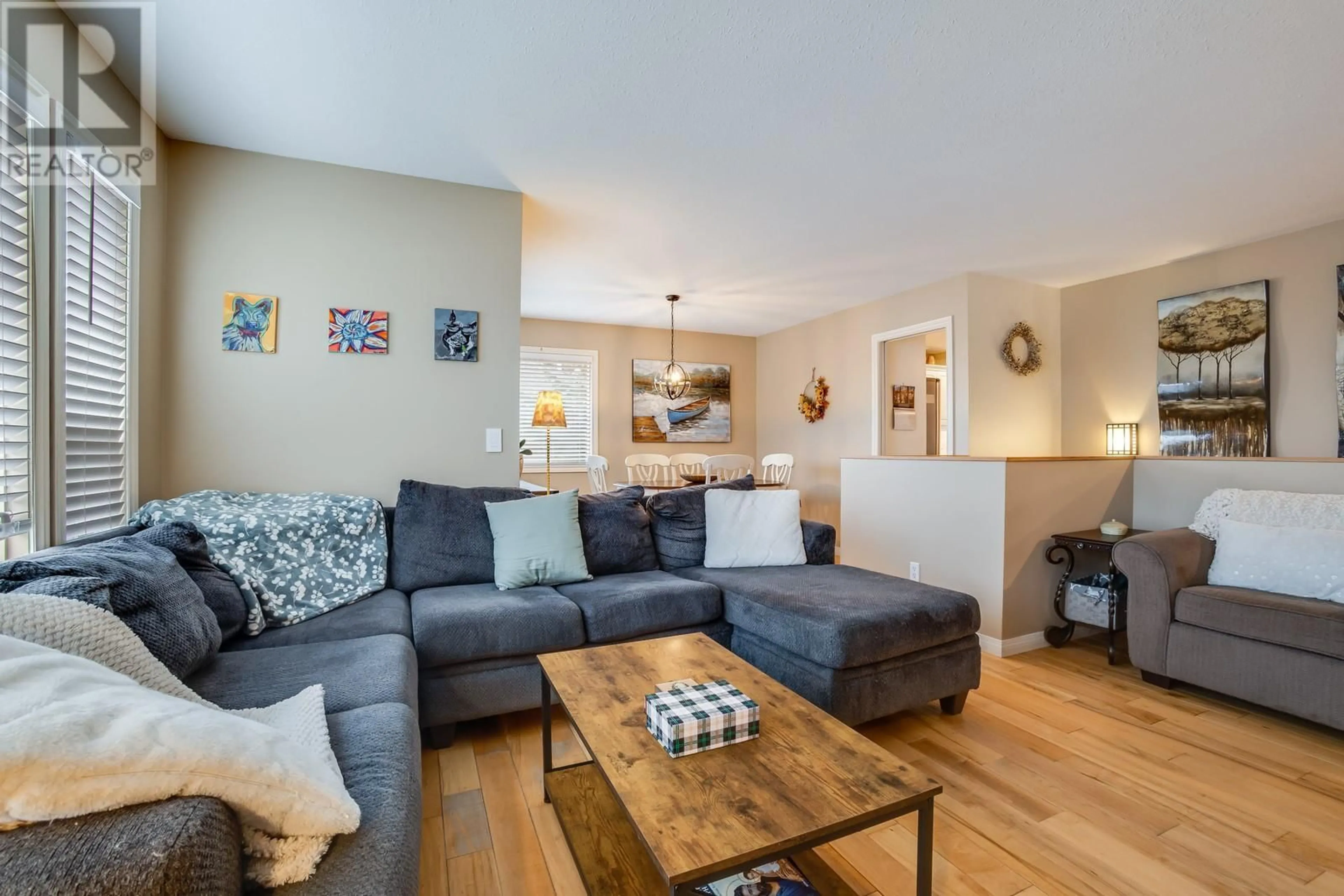 Living room with furniture, wood/laminate floor for 3166 BROADVIEW PLACE, West Kelowna British Columbia V4T1M9