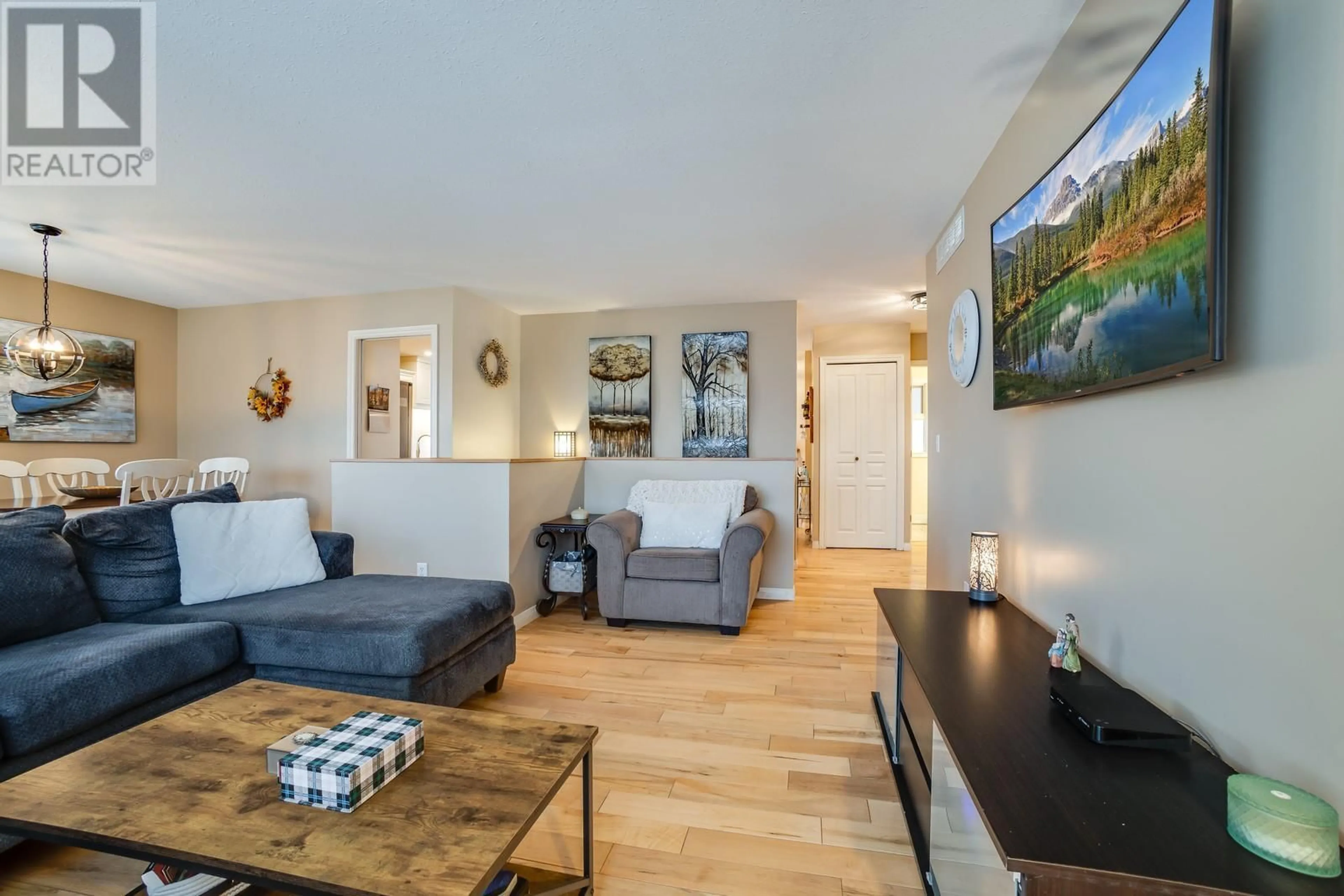 Living room with furniture, wood/laminate floor for 3166 BROADVIEW PLACE, West Kelowna British Columbia V4T1M9