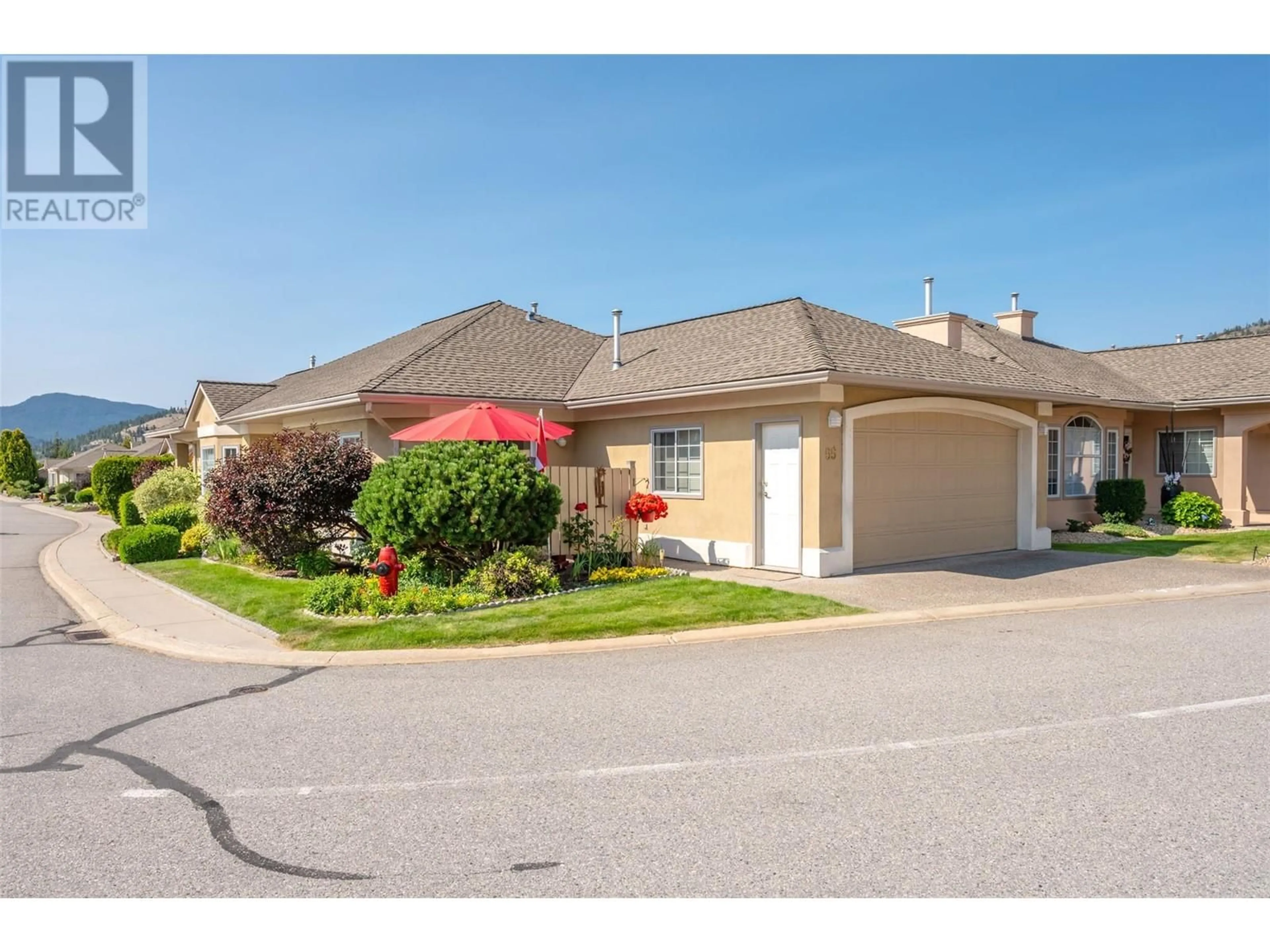 A pic from outside/outdoor area/front of a property/back of a property/a pic from drone, street for 55 - 9800 TURNER STREET, Summerland British Columbia V0H1Z5