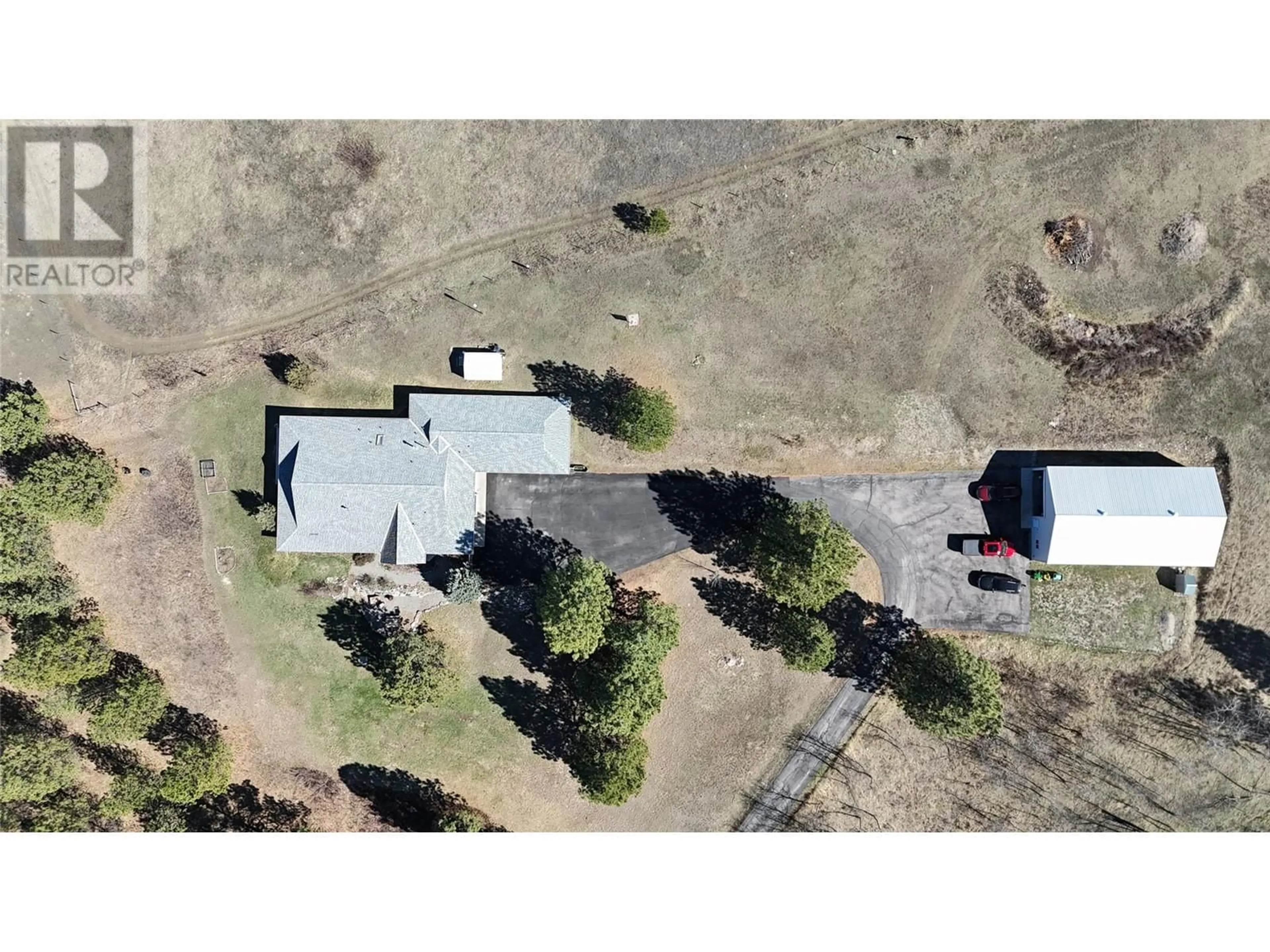 A pic from outside/outdoor area/front of a property/back of a property/a pic from drone, building for 3041 BLACK ANGUS ROAD, Cranbrook British Columbia V1C7C6