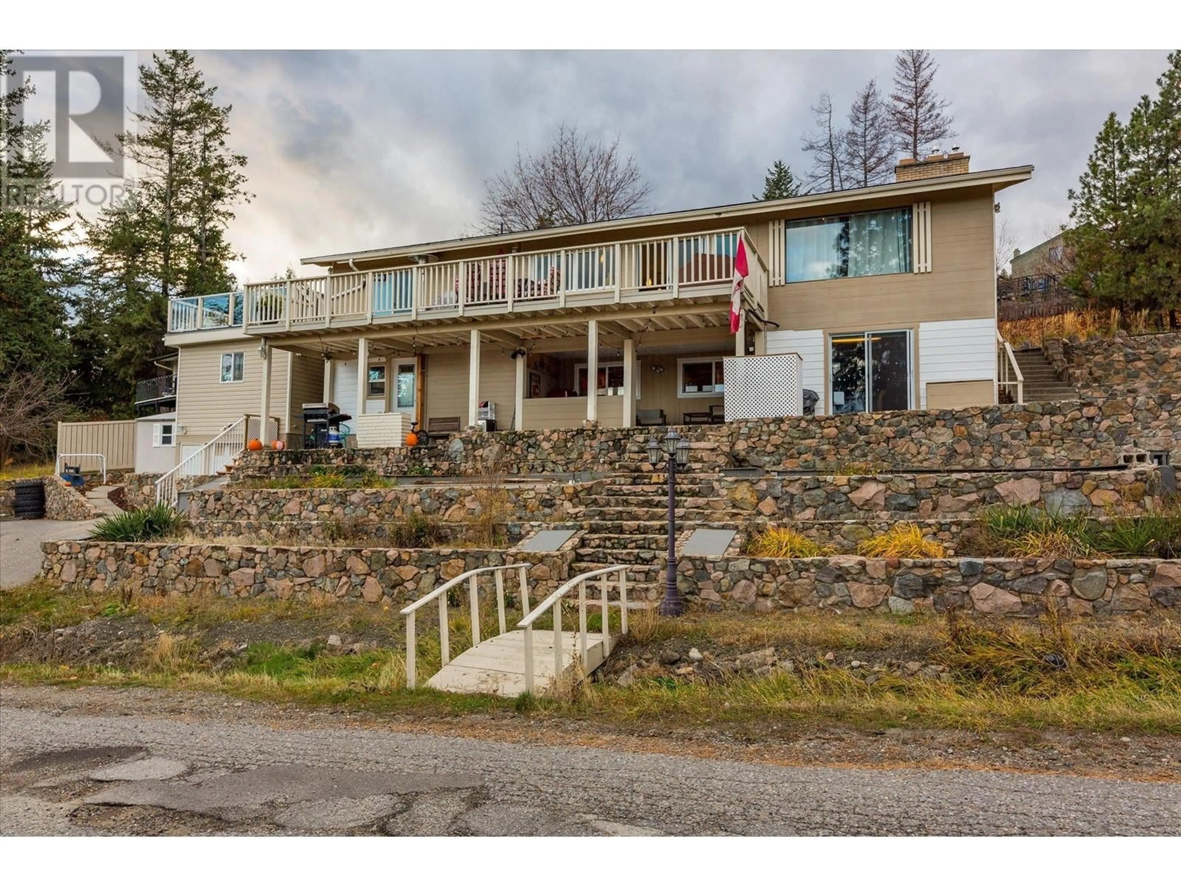 A pic from outside/outdoor area/front of a property/back of a property/a pic from drone, unknown for 1572 Parkinson Road, West Kelowna British Columbia V1Z2X2