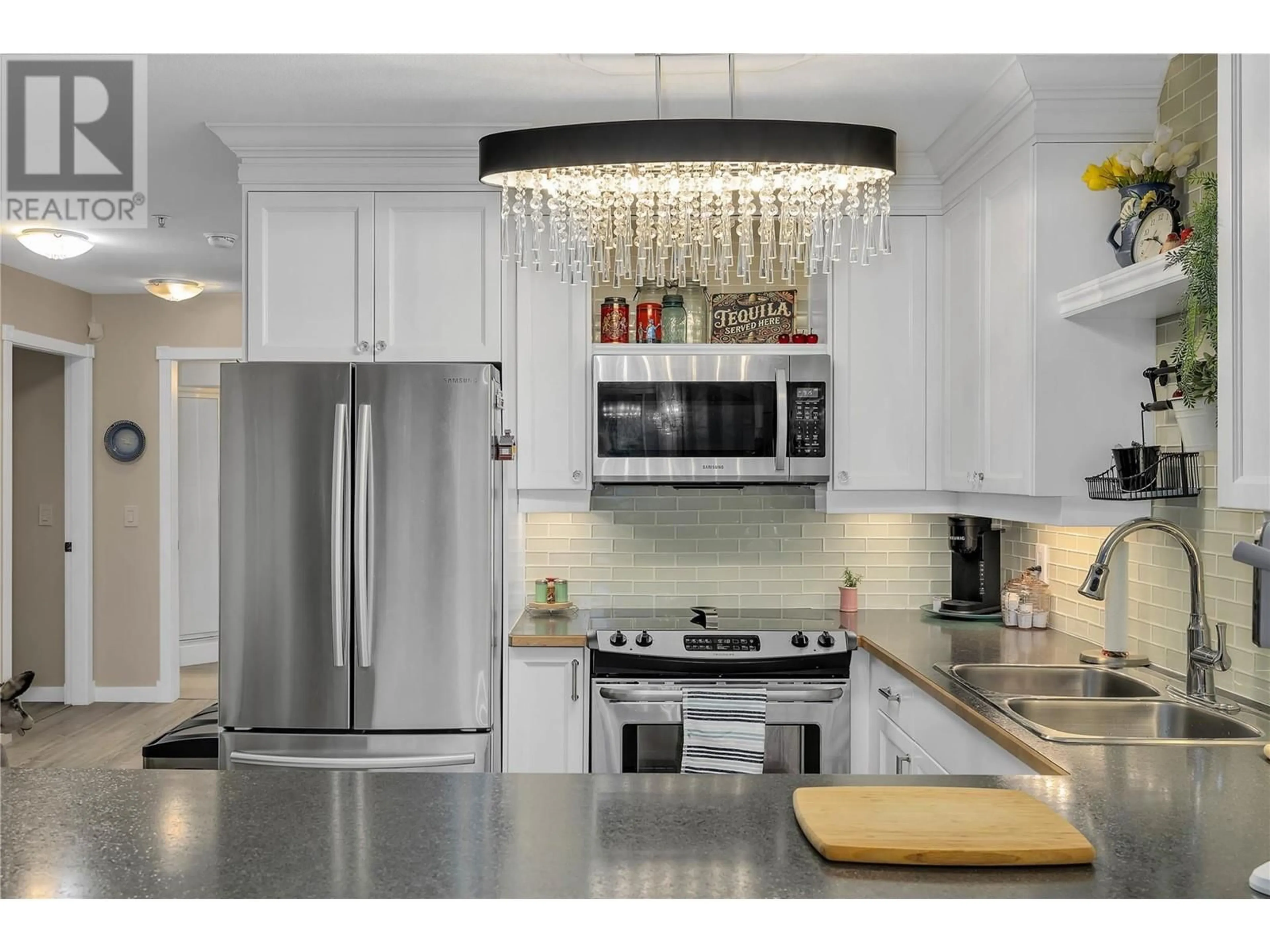 Contemporary kitchen, ceramic/tile floor for 103 - 1965 PANDOSY STREET, Kelowna British Columbia V1Y1R9