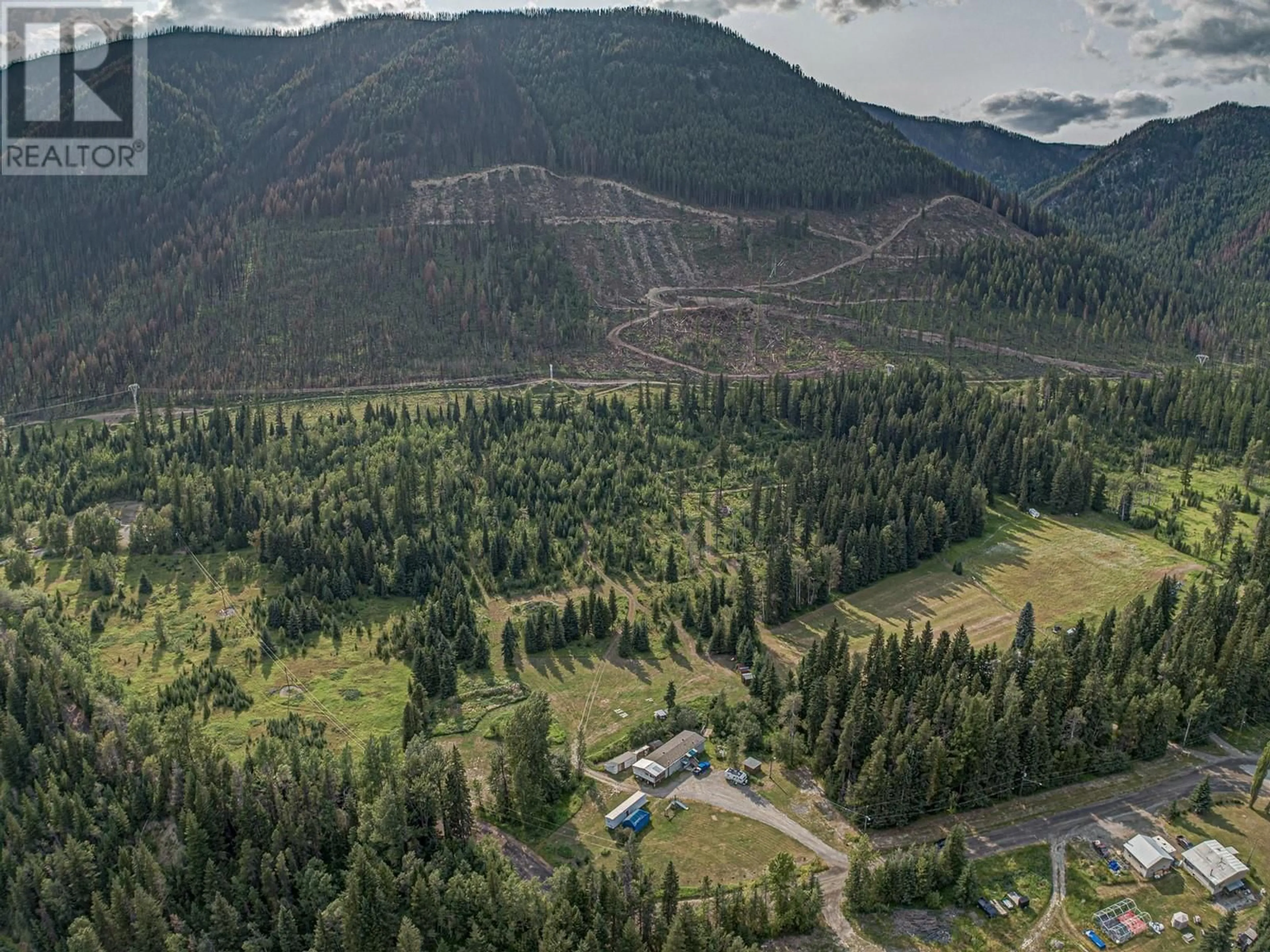 A pic from outside/outdoor area/front of a property/back of a property/a pic from drone, mountain view for 1191 MATEVIC ROAD, Sparwood British Columbia V0B2G1