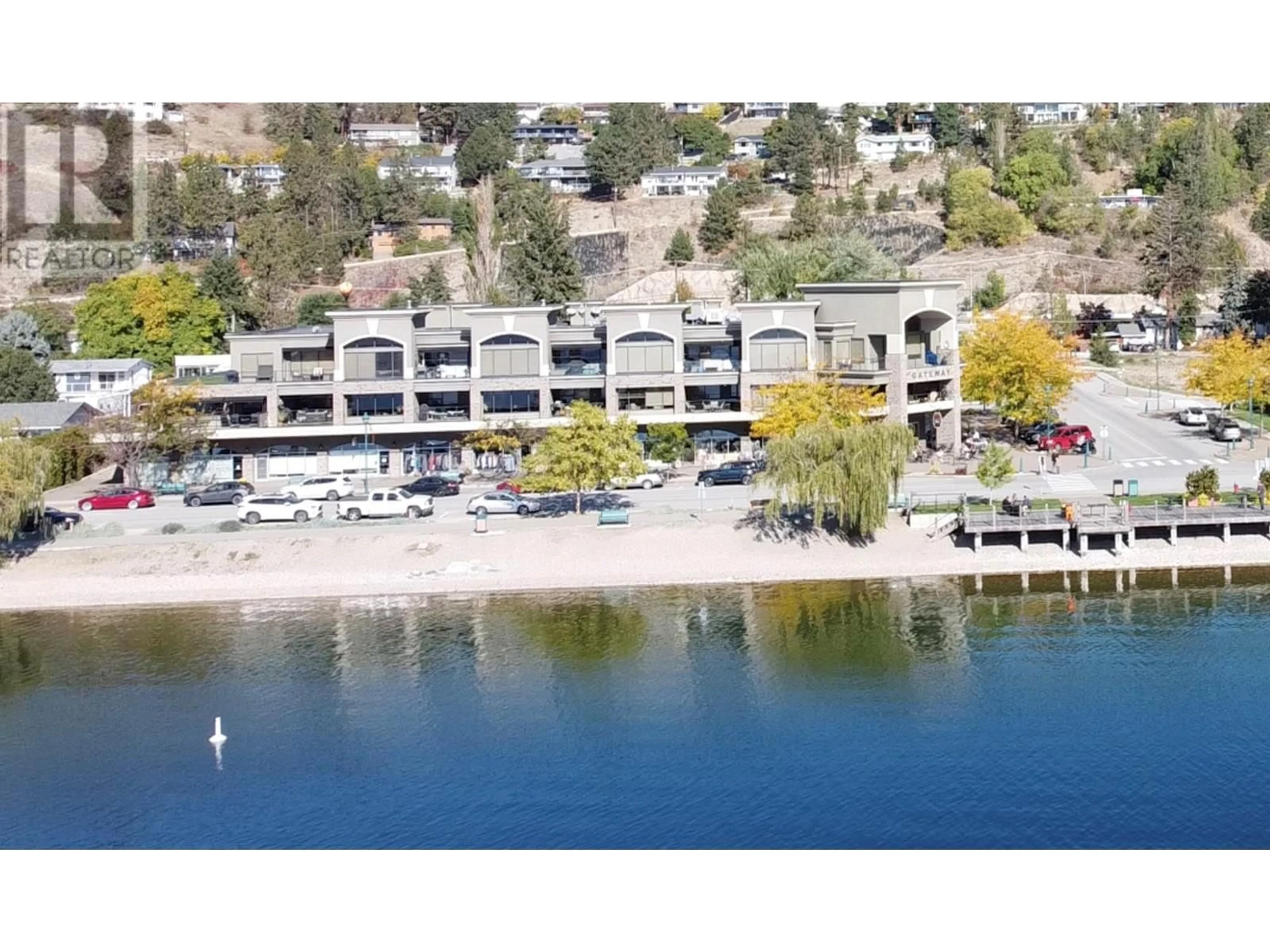 A pic from outside/outdoor area/front of a property/back of a property/a pic from drone, water/lake/river/ocean view for 4200 Beach Avenue Unit# 305, Peachland British Columbia V0H1X6