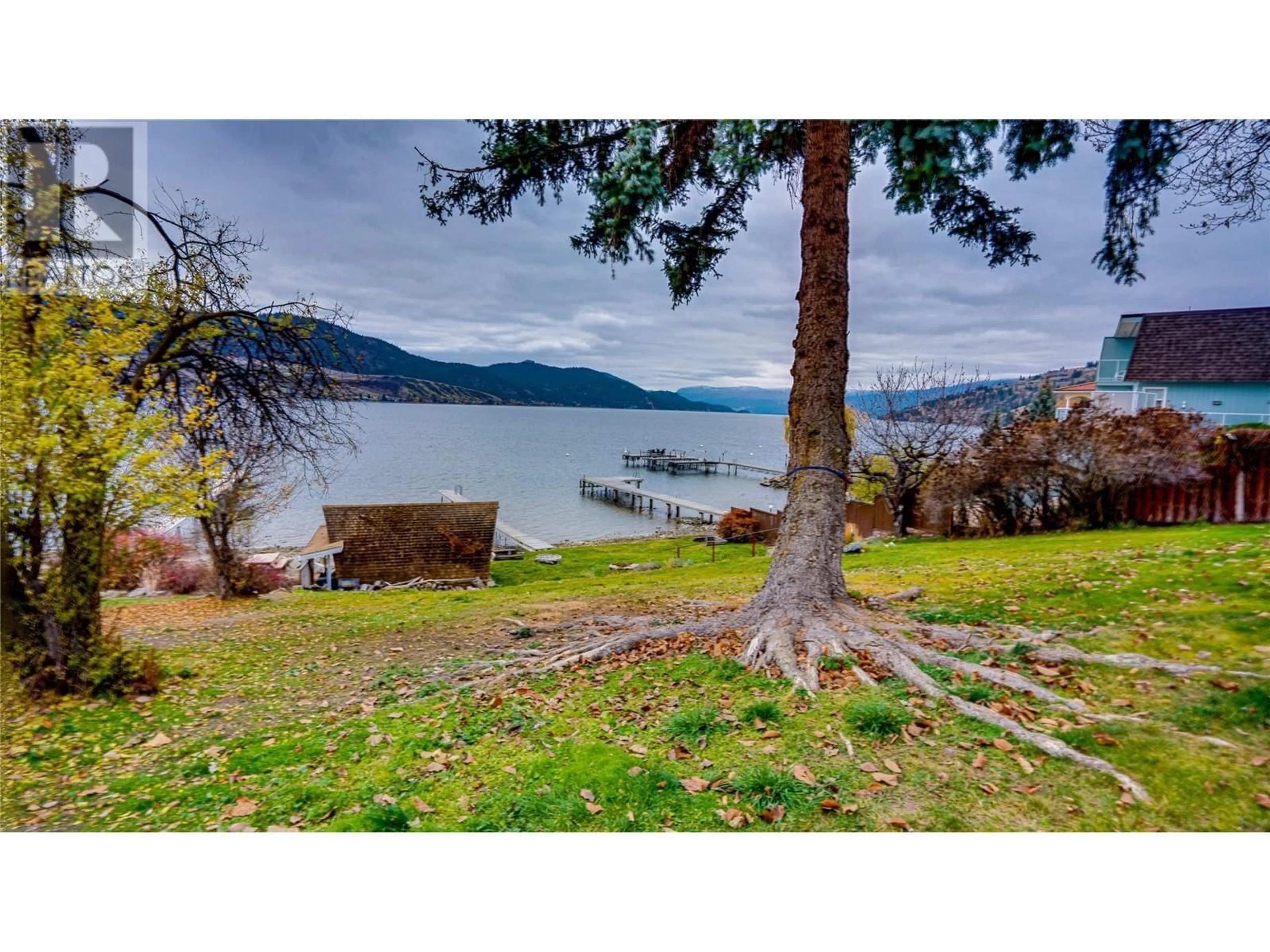 A pic from outside/outdoor area/front of a property/back of a property/a pic from drone, water/lake/river/ocean view for 7856 TRONSON ROAD, Vernon British Columbia V1H1C6