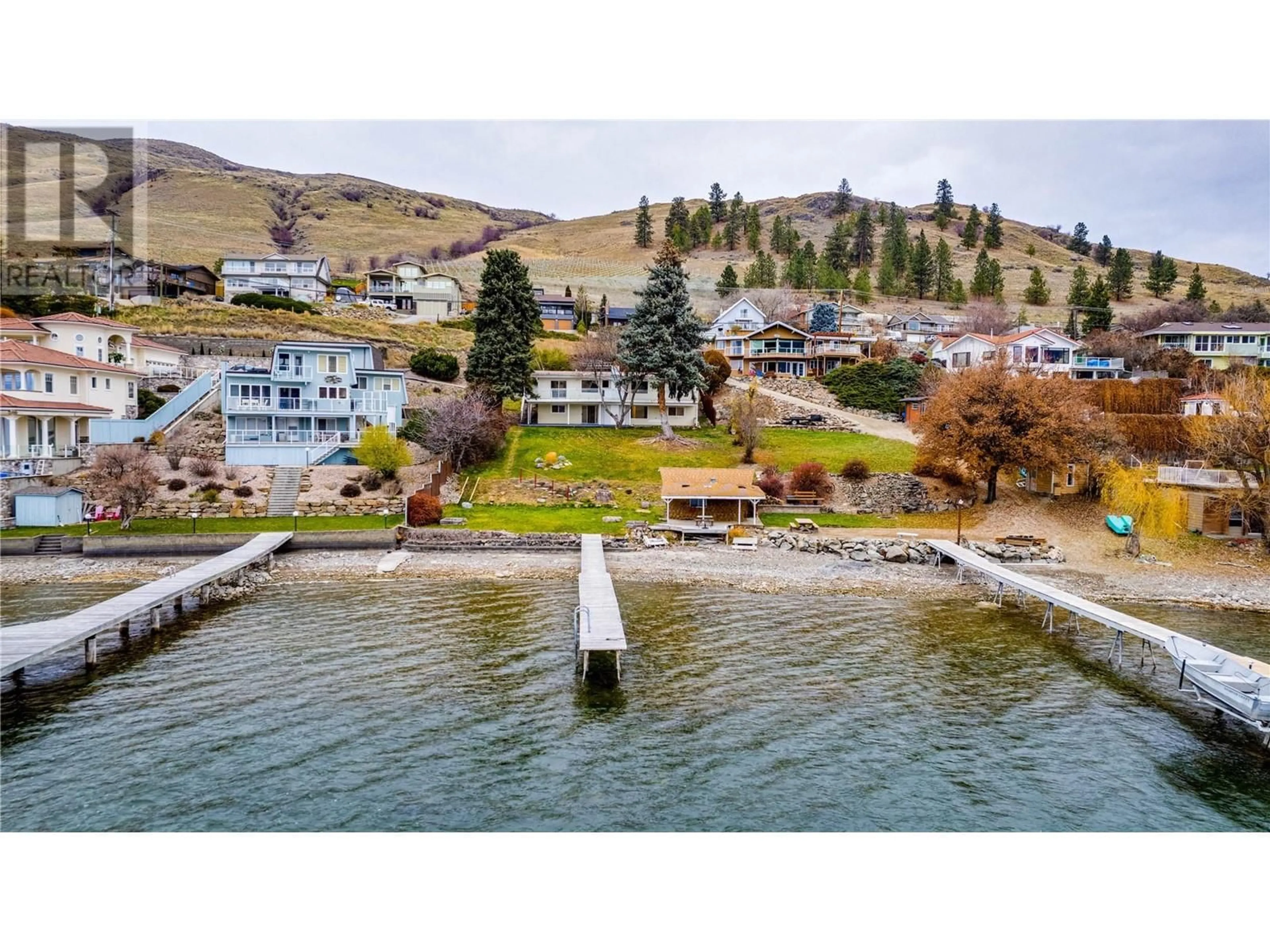 A pic from outside/outdoor area/front of a property/back of a property/a pic from drone, water/lake/river/ocean view for 7856 Tronson Road, Vernon British Columbia V1H1C6