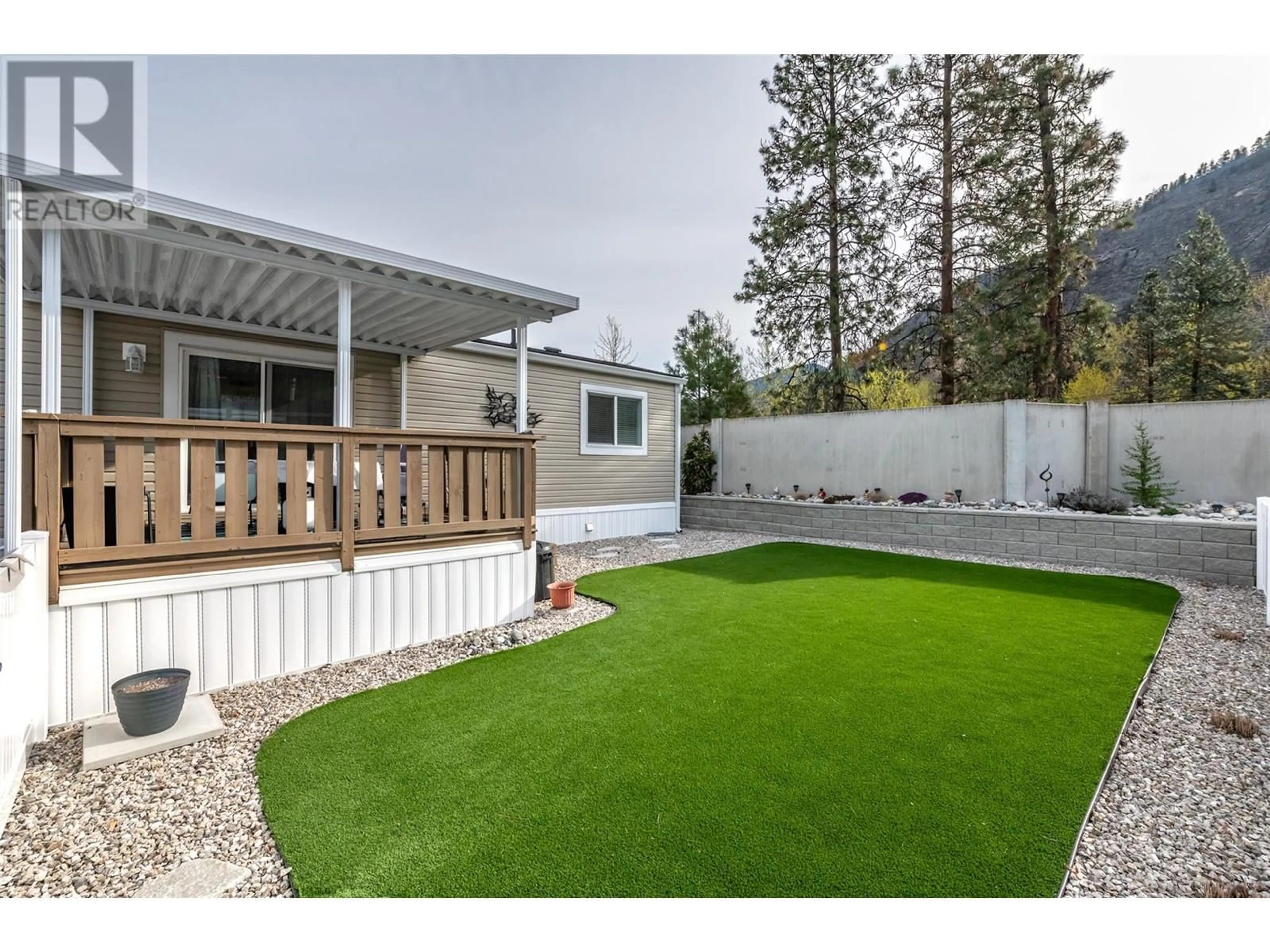 Home with vinyl exterior material, mountain view for 102 - 8598 HWY 97 OTHER, Oliver British Columbia V0H1T2