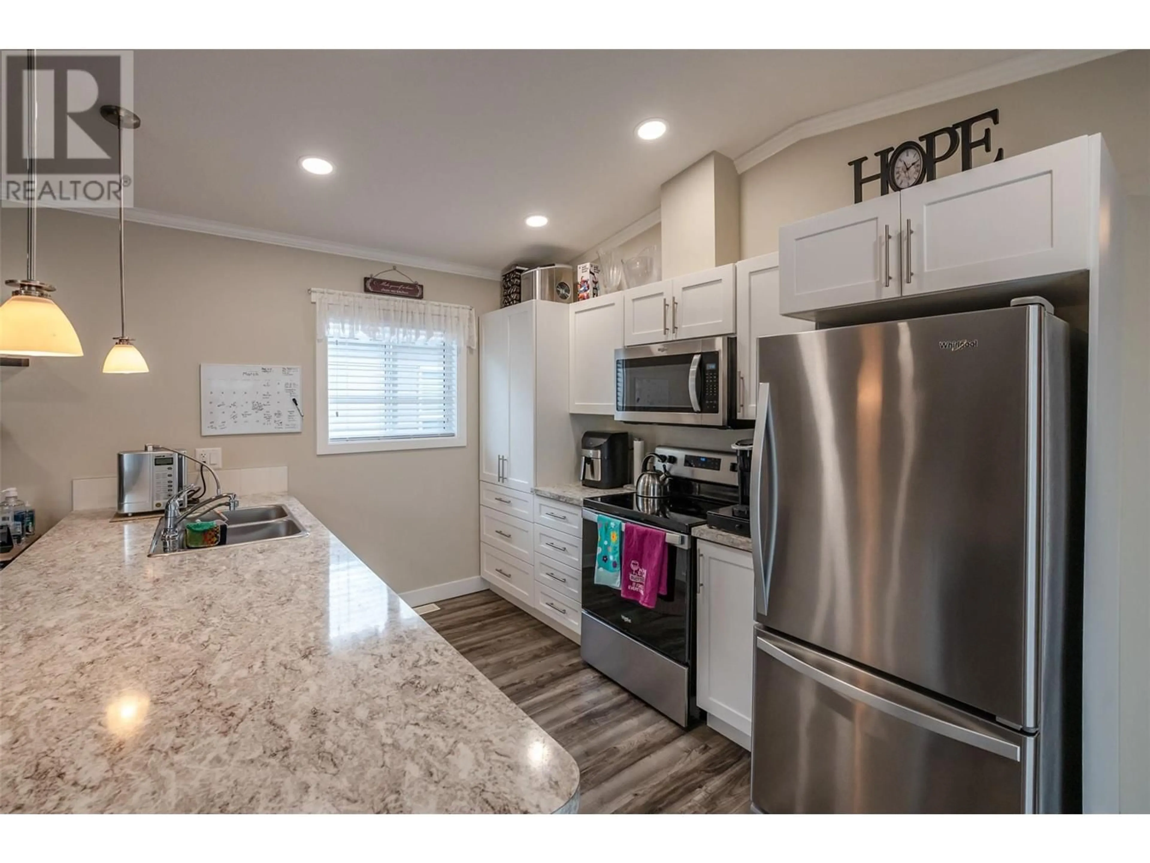 Open concept kitchen, unknown for 102 - 8598 HWY 97 OTHER, Oliver British Columbia V0H1T2