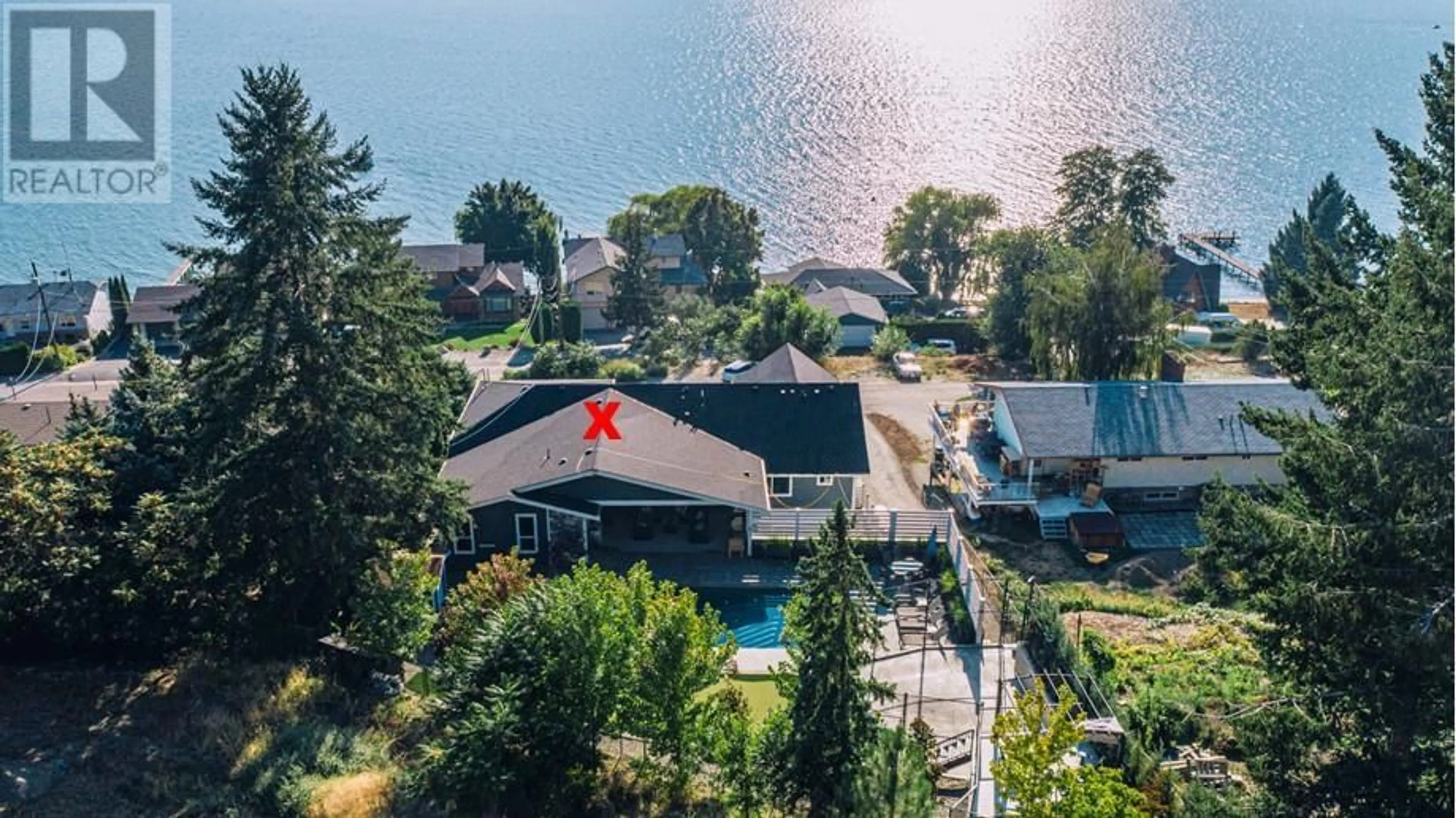 A pic from outside/outdoor area/front of a property/back of a property/a pic from drone, water/lake/river/ocean view for 12879 Pixton Road, Lake Country British Columbia V4V1C9