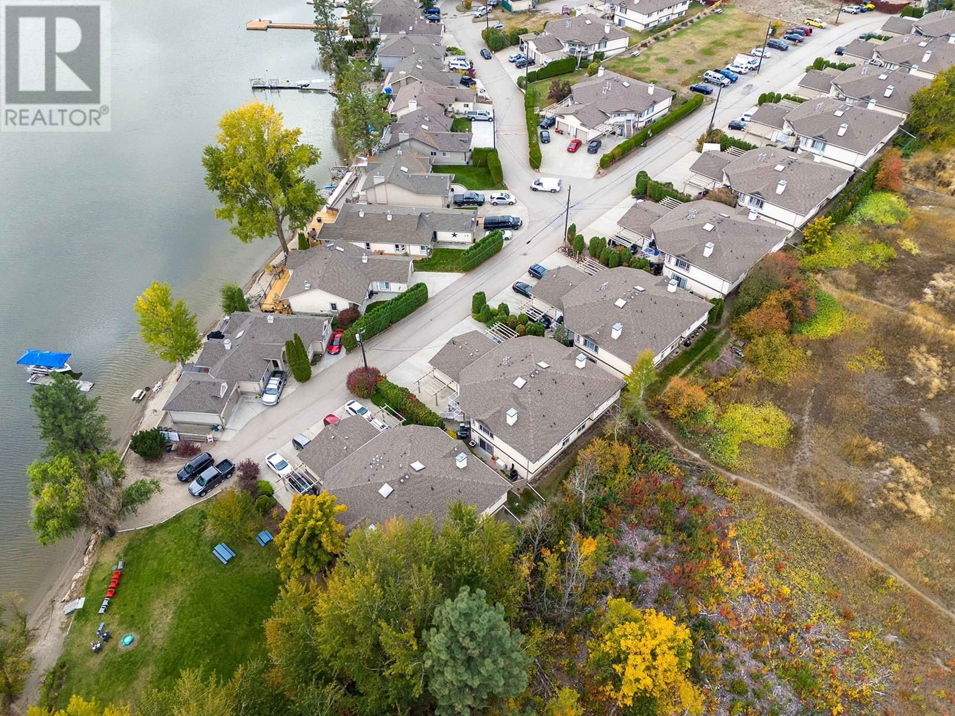 A pic from outside/outdoor area/front of a property/back of a property/a pic from drone, water/lake/river/ocean view for 107-3 7841 97 Highway, Lake Country British Columbia V4V1E7