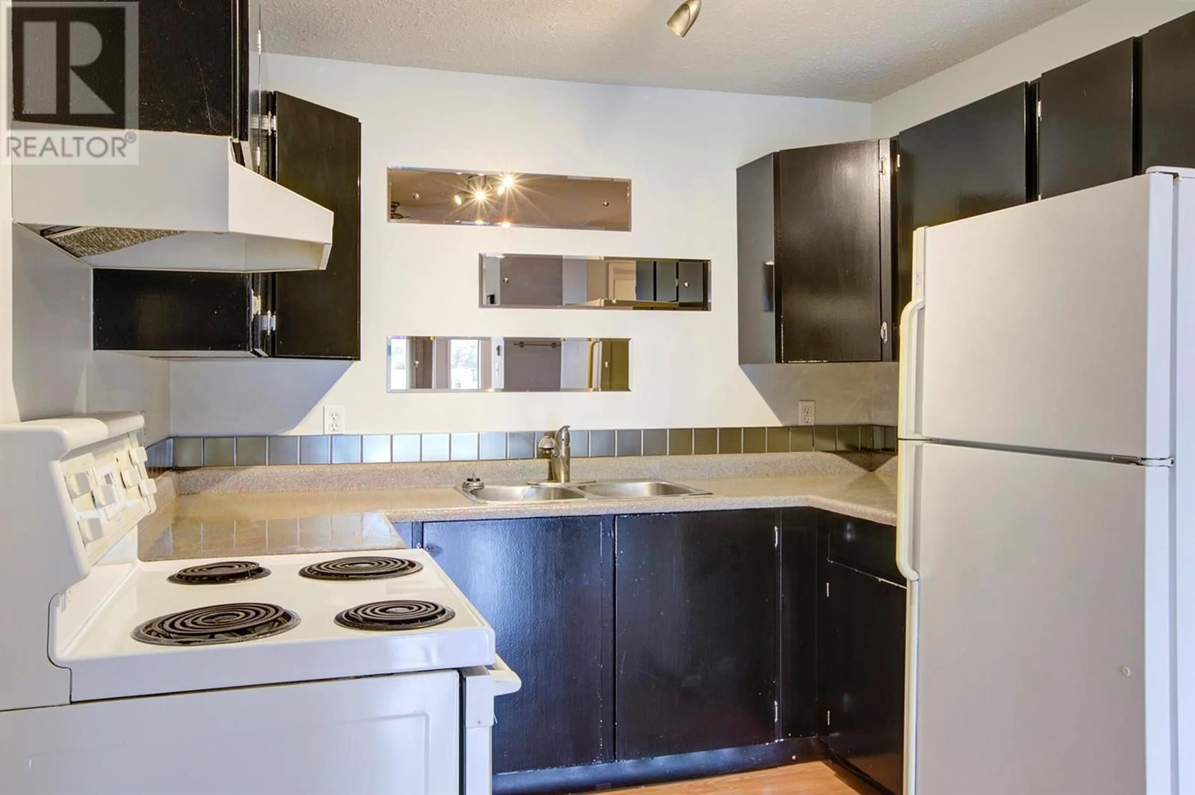 Standard kitchen, unknown for 4004 34 Street Unit# 104, Vernon British Columbia V1T5Y2