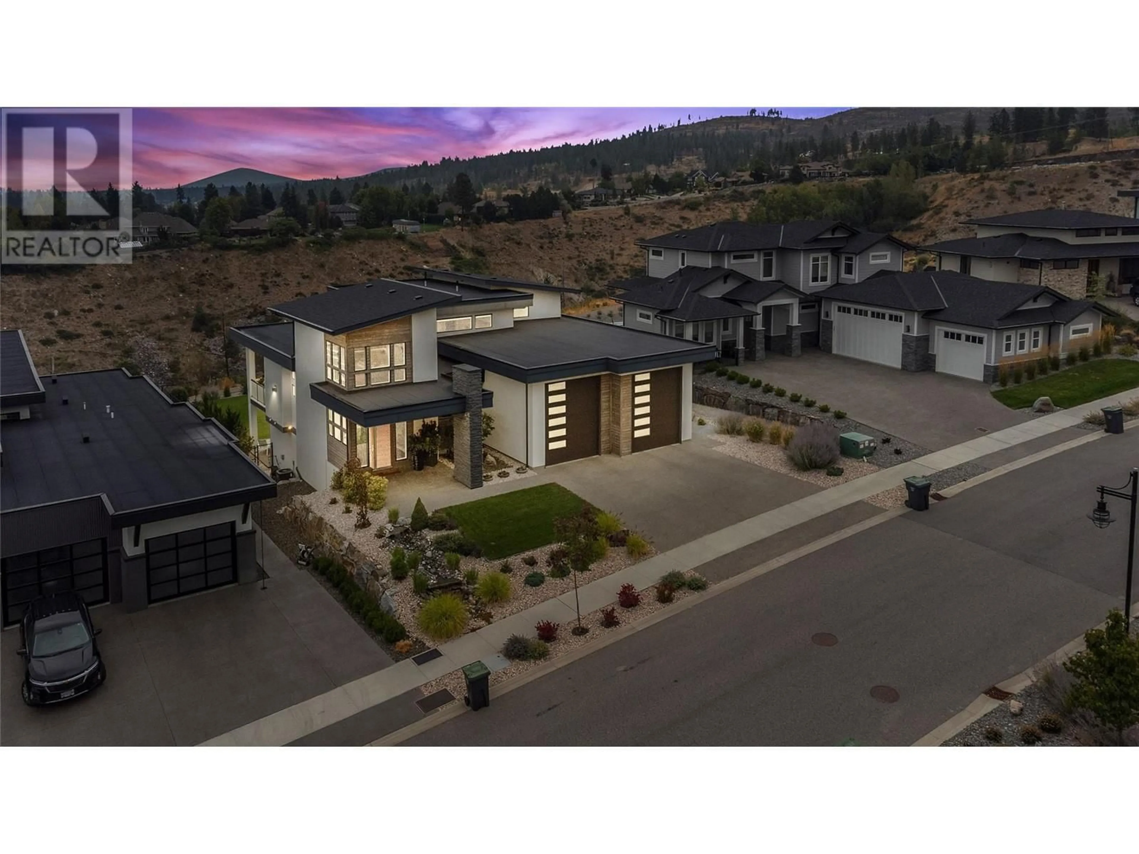 A pic from outside/outdoor area/front of a property/back of a property/a pic from drone, street for 1648 Fawn Run Drive, Kelowna British Columbia V1W5M8