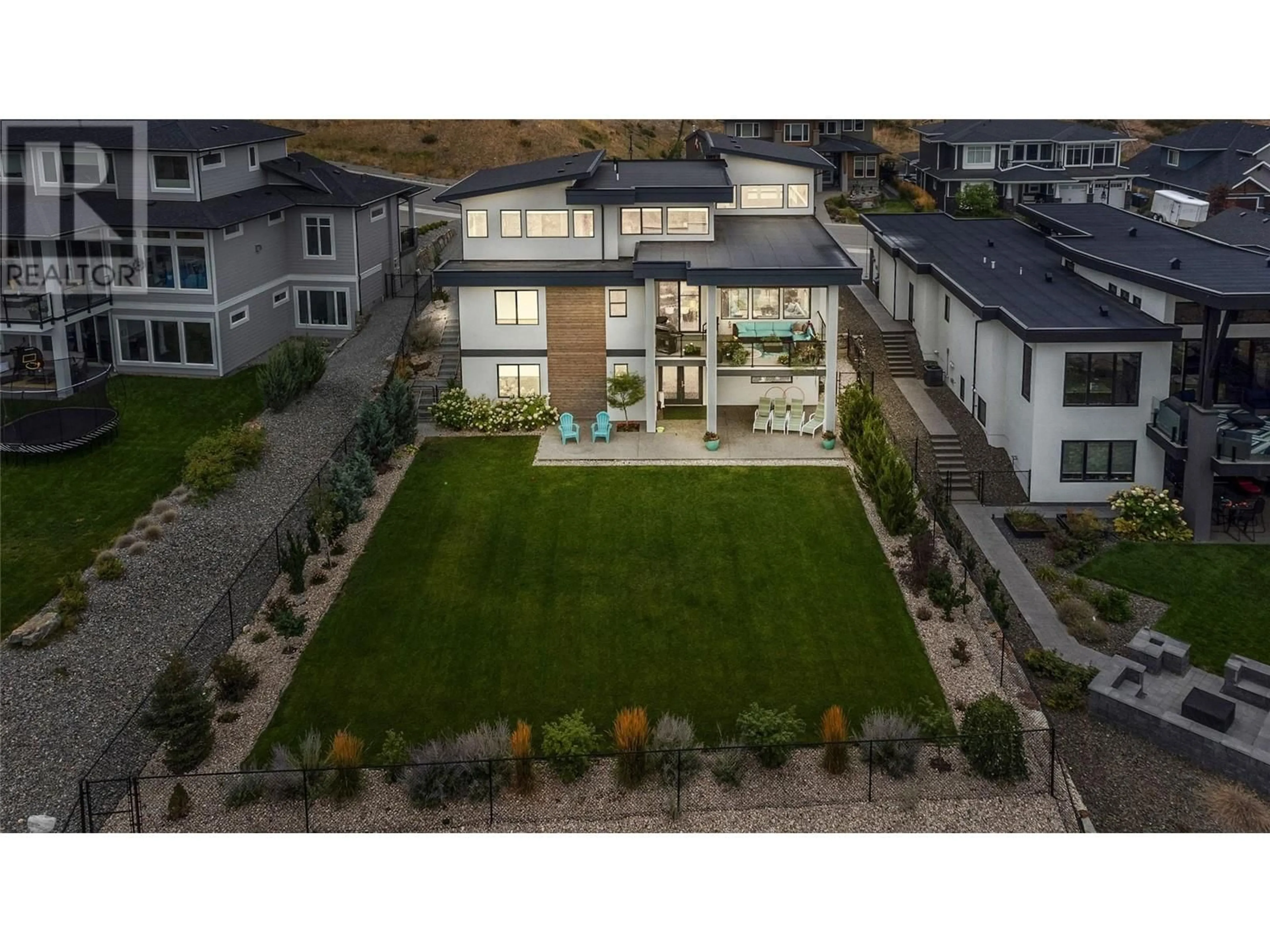 A pic from outside/outdoor area/front of a property/back of a property/a pic from drone, unknown for 1648 Fawn Run Drive, Kelowna British Columbia V1W5M8