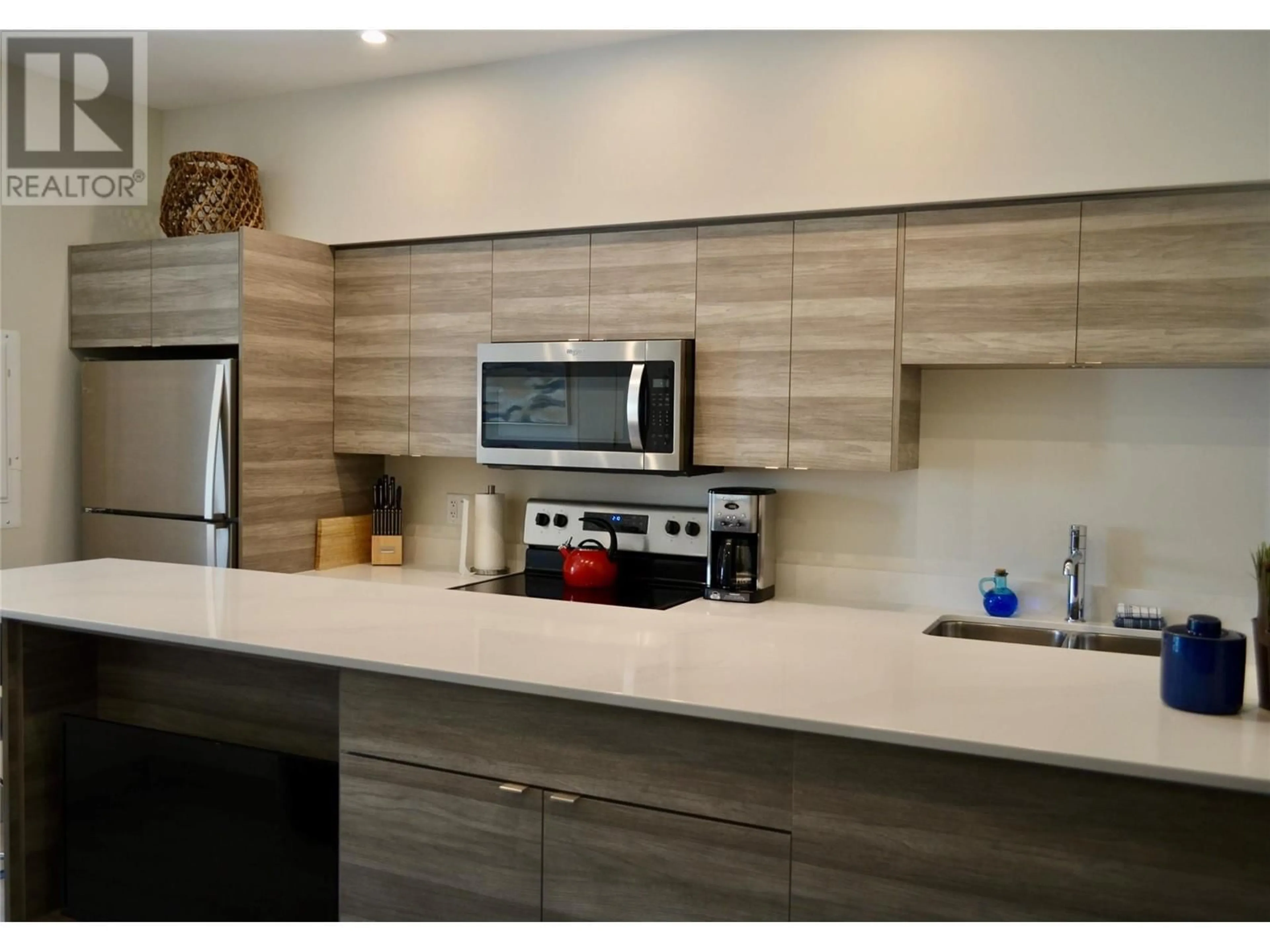 Open concept kitchen, unknown for 2555 Lakeshore Road Unit# 221, Vernon British Columbia V1H0A4