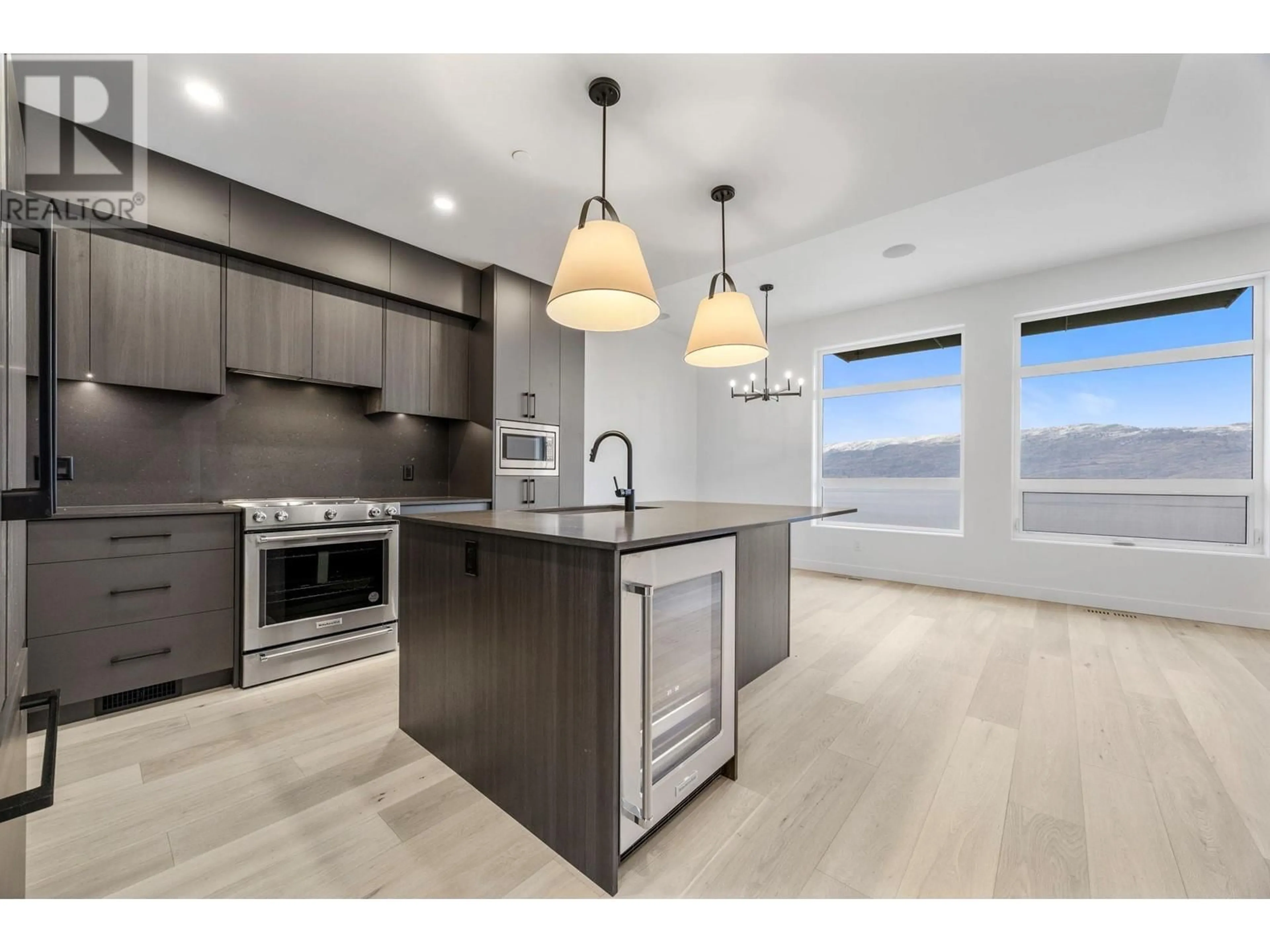 Open concept kitchen, unknown for 6012 Princess Street, Peachland British Columbia V0H1X7