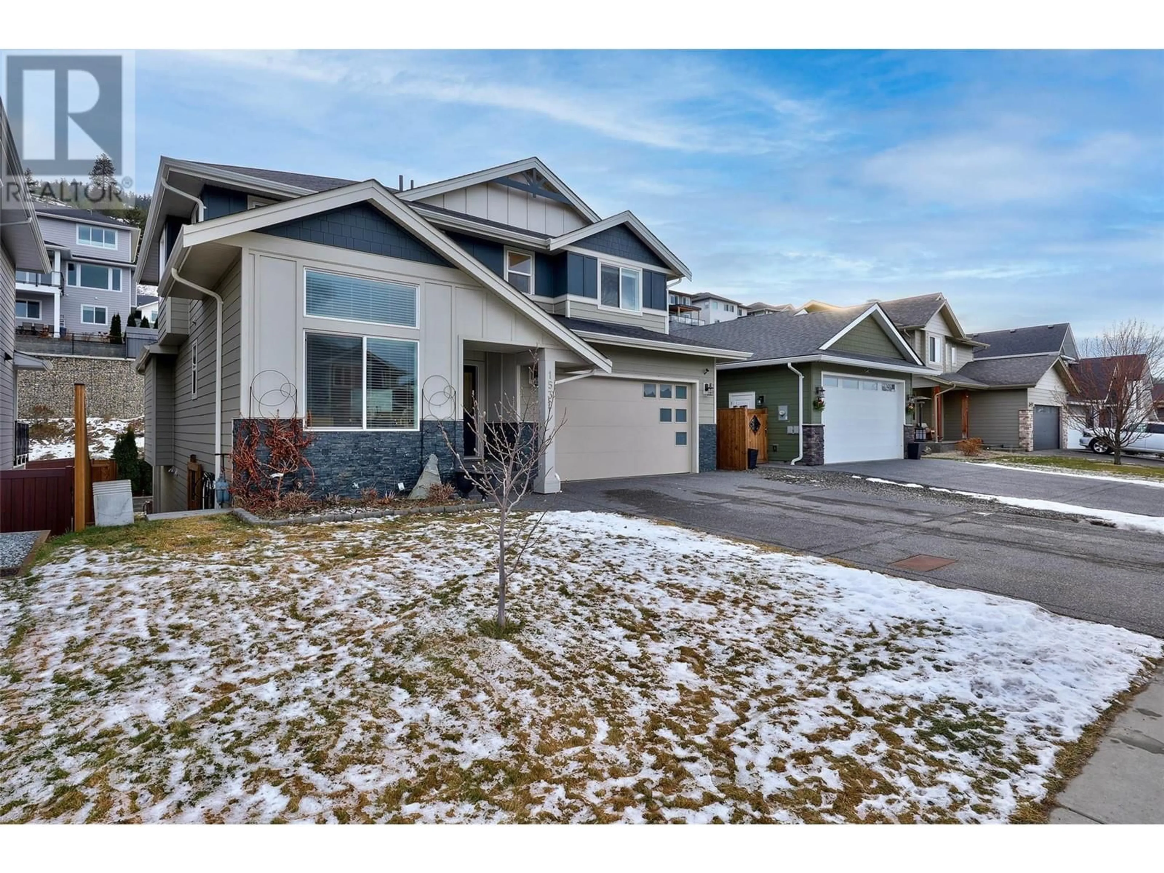 Home with vinyl exterior material, street for 1532 Emerald Drive, Kamloops British Columbia V2E0C1