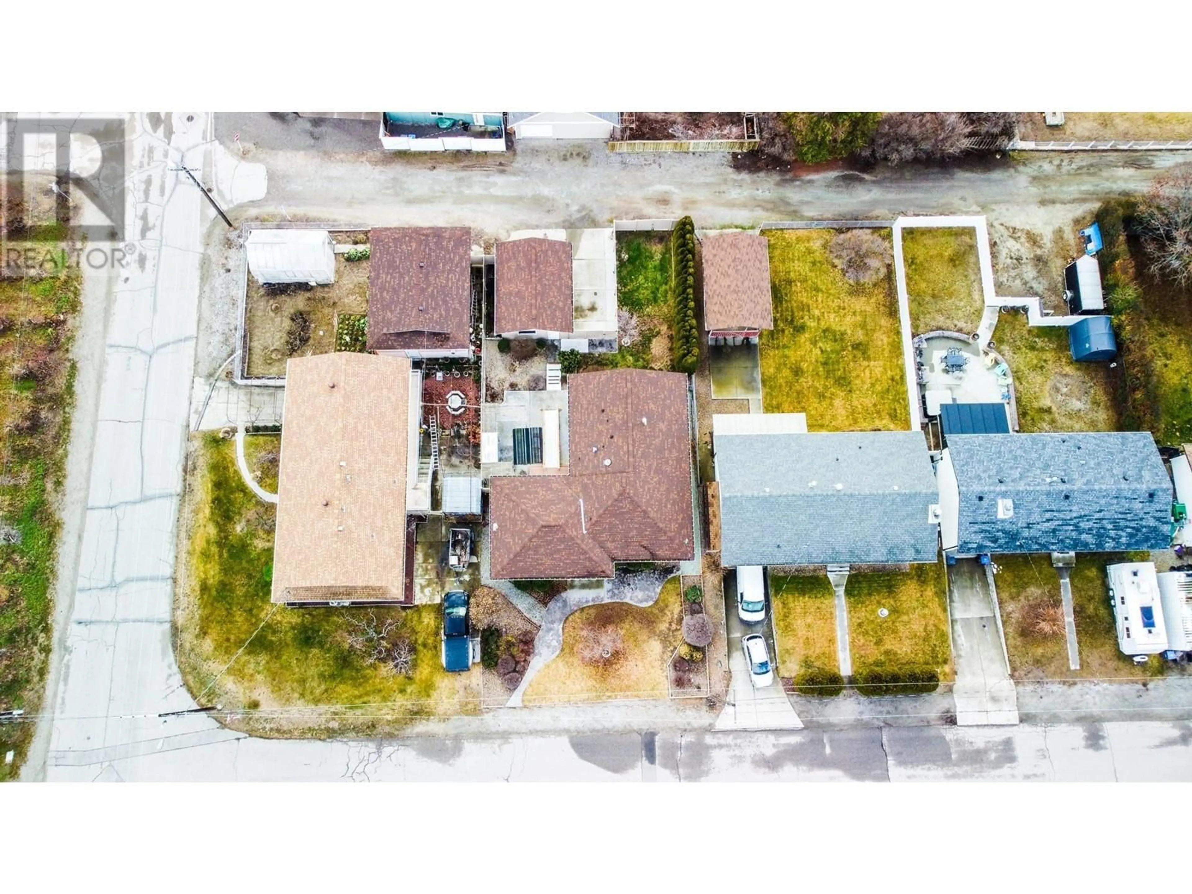 A pic from outside/outdoor area/front of a property/back of a property/a pic from drone, street for 4 Willow Crescent, Osoyoos British Columbia V0H1V3