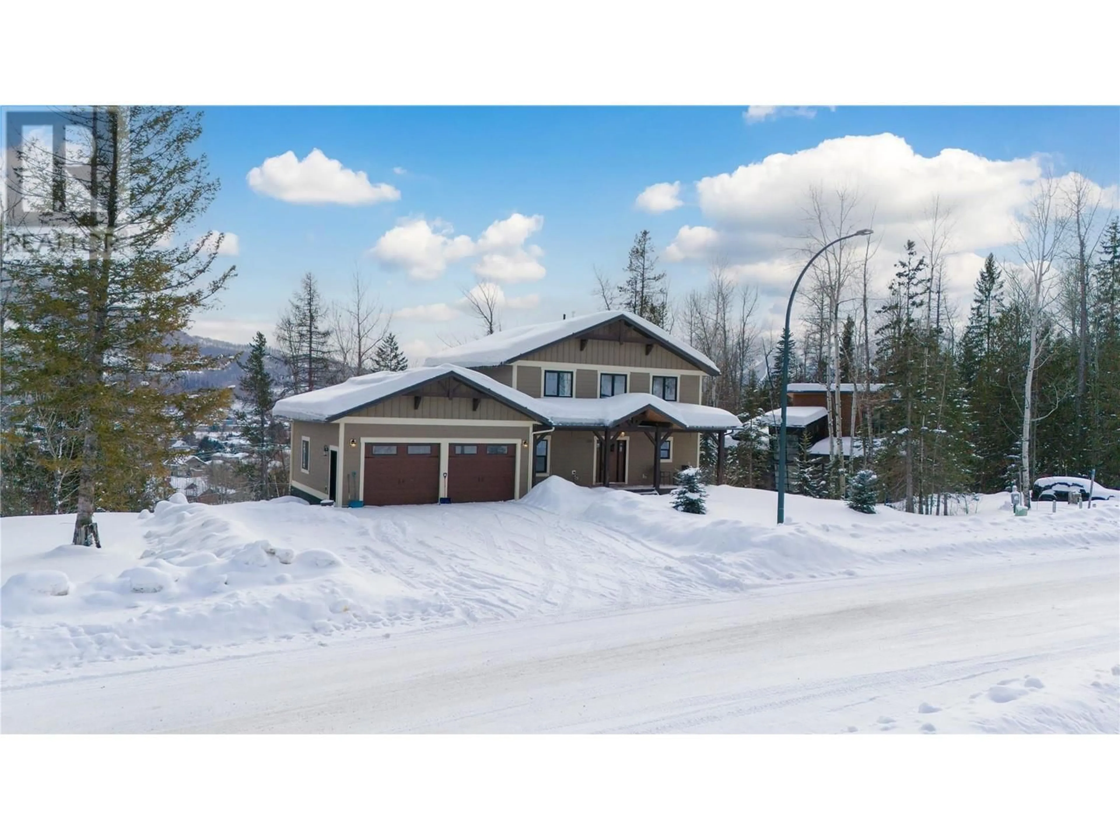 A pic from outside/outdoor area/front of a property/back of a property/a pic from drone, street for 105 Burma Road, Fernie British Columbia V0B1M5