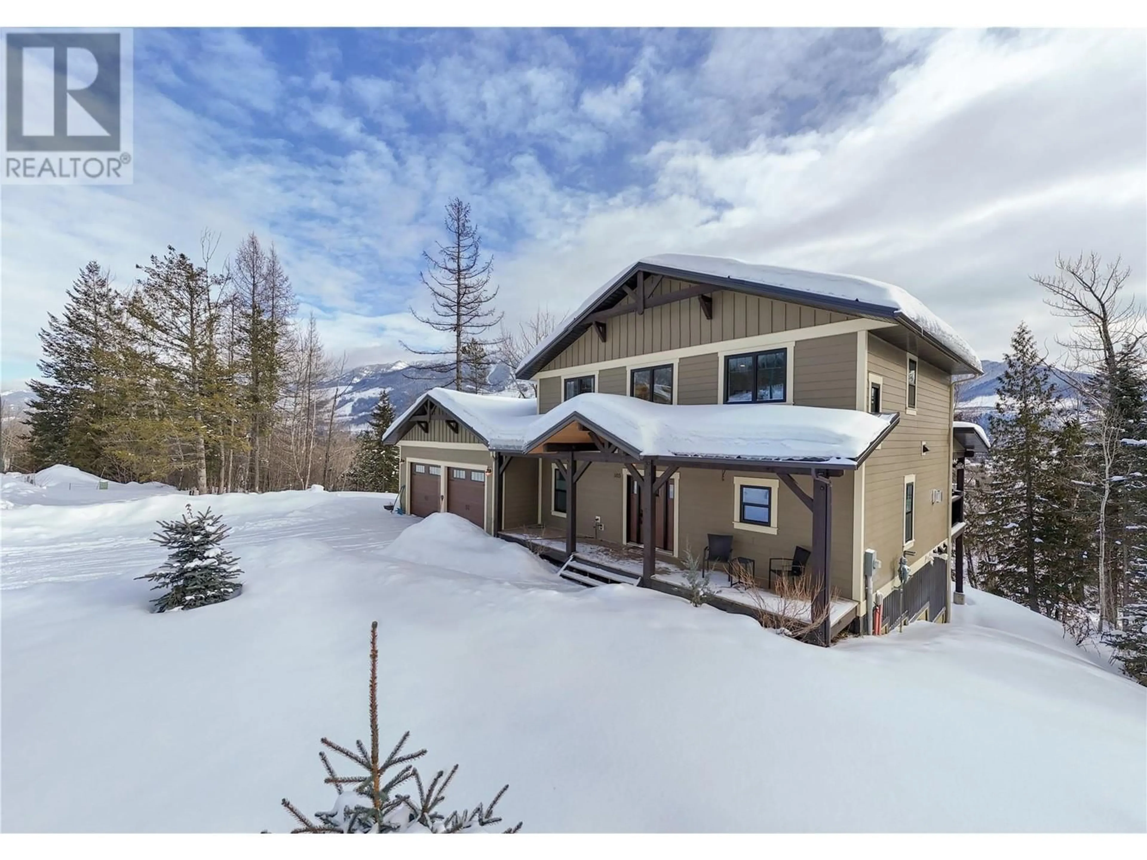 A pic from outside/outdoor area/front of a property/back of a property/a pic from drone, mountain view for 105 Burma Road, Fernie British Columbia V0B1M5