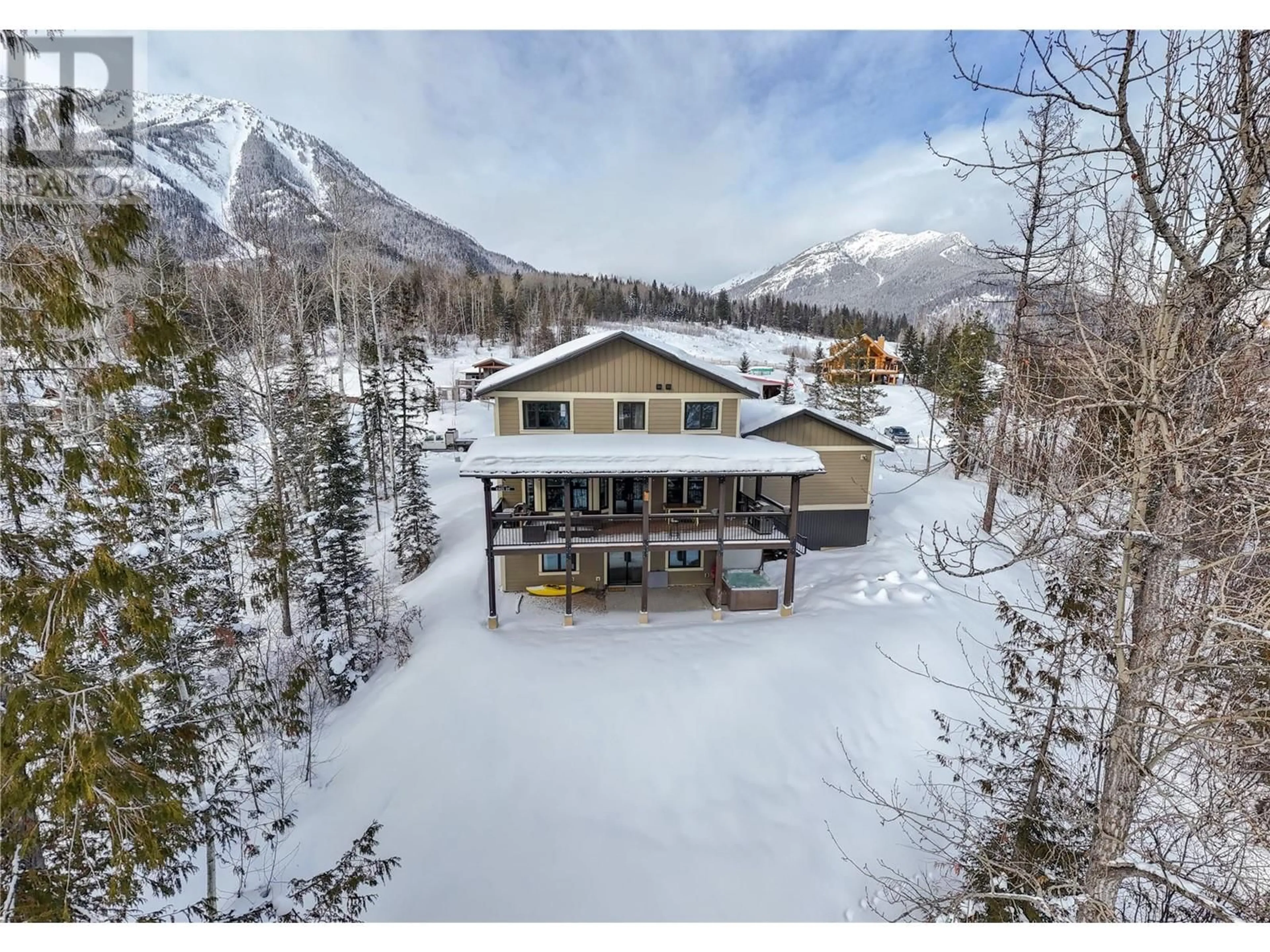 A pic from outside/outdoor area/front of a property/back of a property/a pic from drone, mountain view for 105 Burma Road, Fernie British Columbia V0B1M5