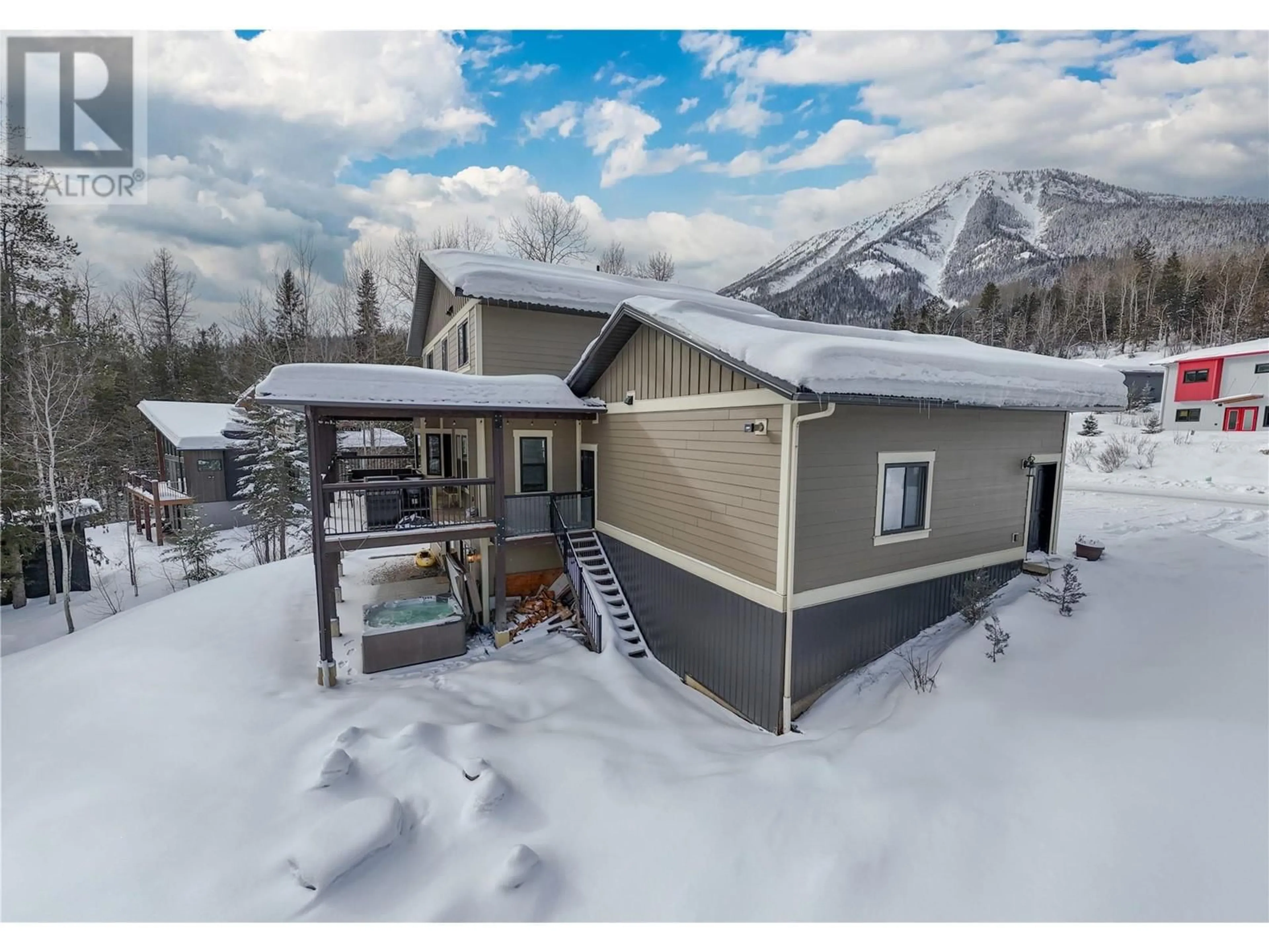 A pic from outside/outdoor area/front of a property/back of a property/a pic from drone, mountain view for 105 Burma Road, Fernie British Columbia V0B1M5