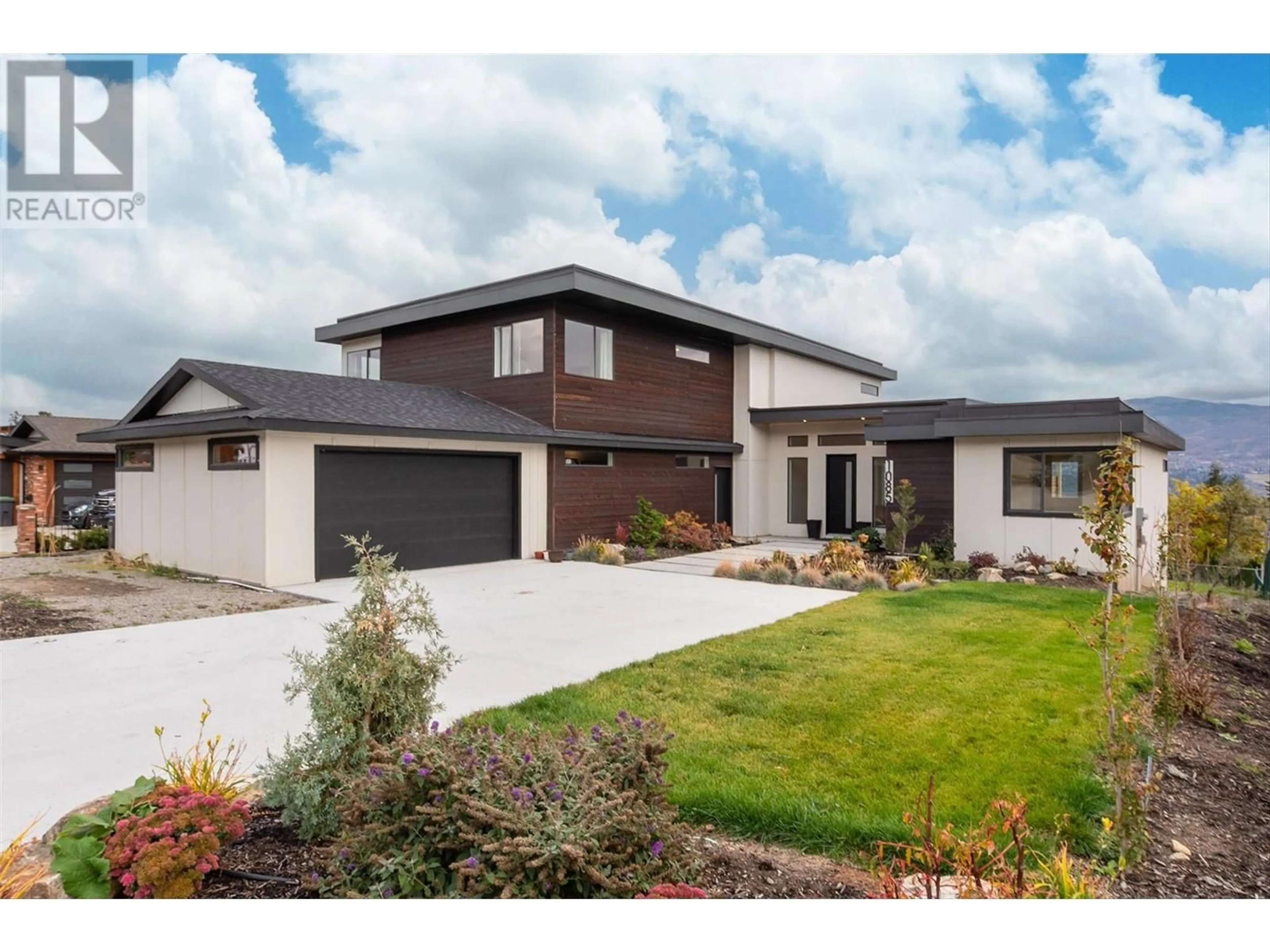 Home with brick exterior material, street for 1085 Aubrey Road, West Kelowna British Columbia V1Z2V9