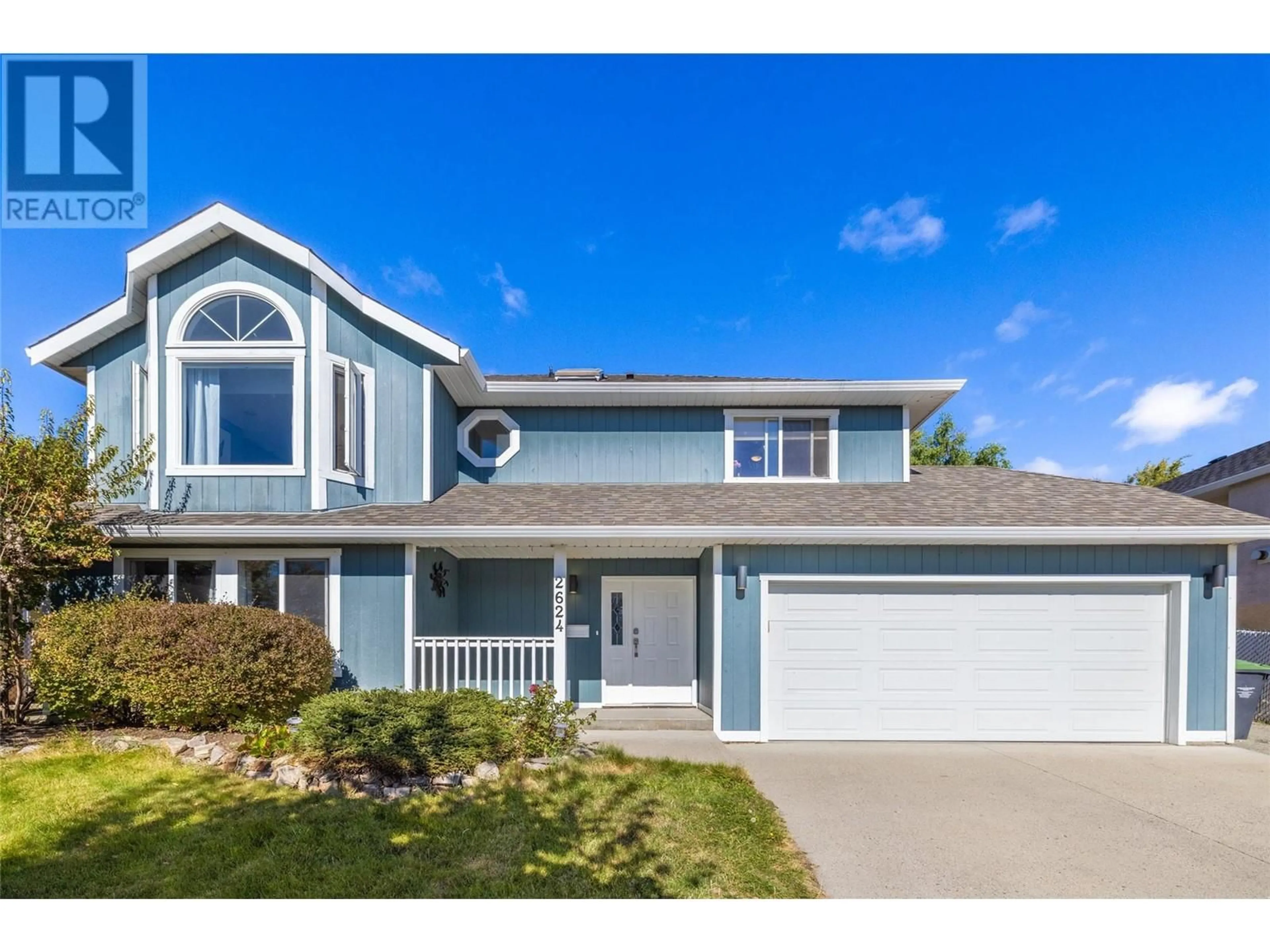 Home with vinyl exterior material, street for 2624 WILD HORSE DRIVE, West Kelowna British Columbia V4T2K9