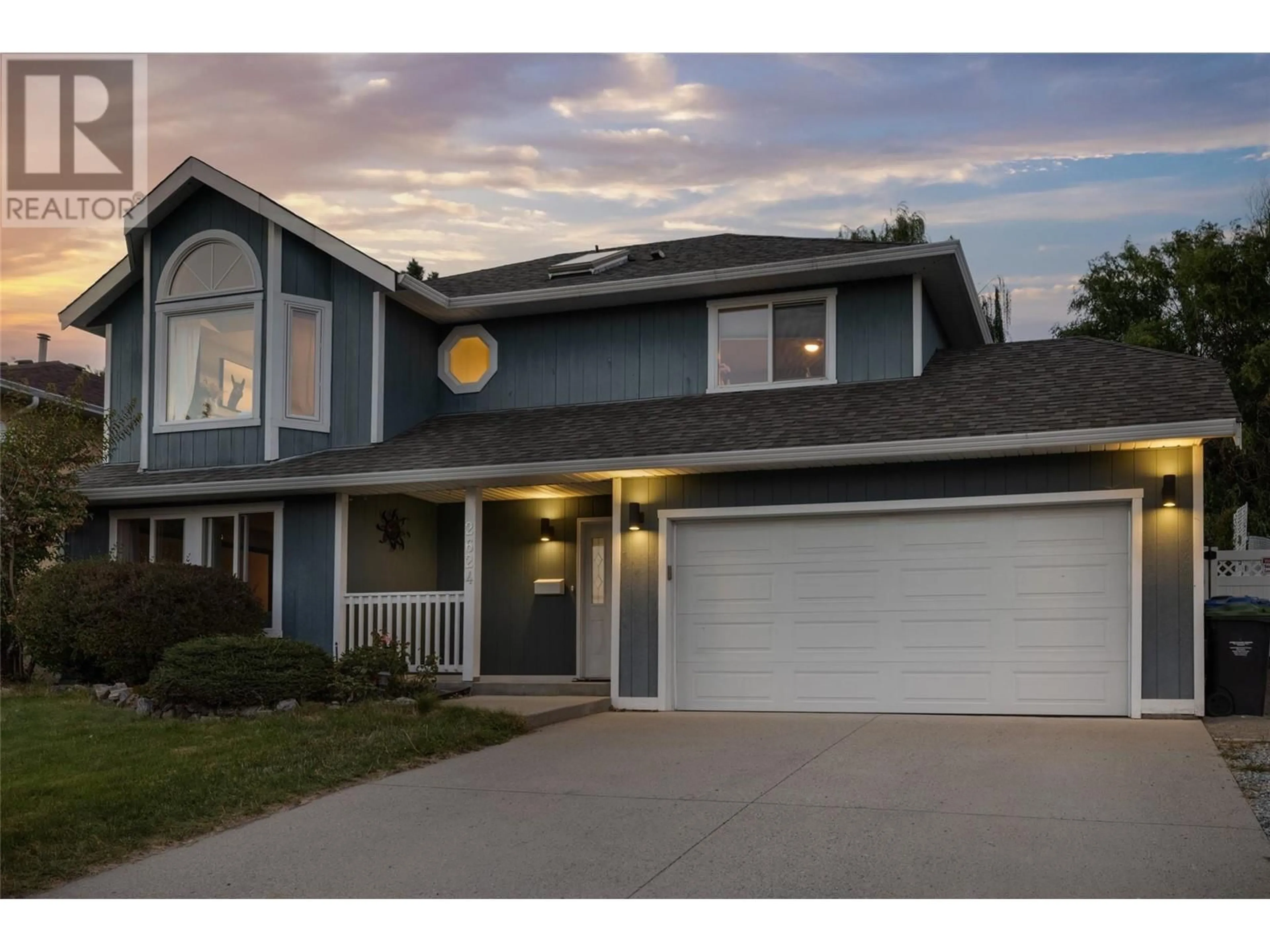 Home with vinyl exterior material, street for 2624 Wild Horse Drive, West Kelowna British Columbia V4T2K9