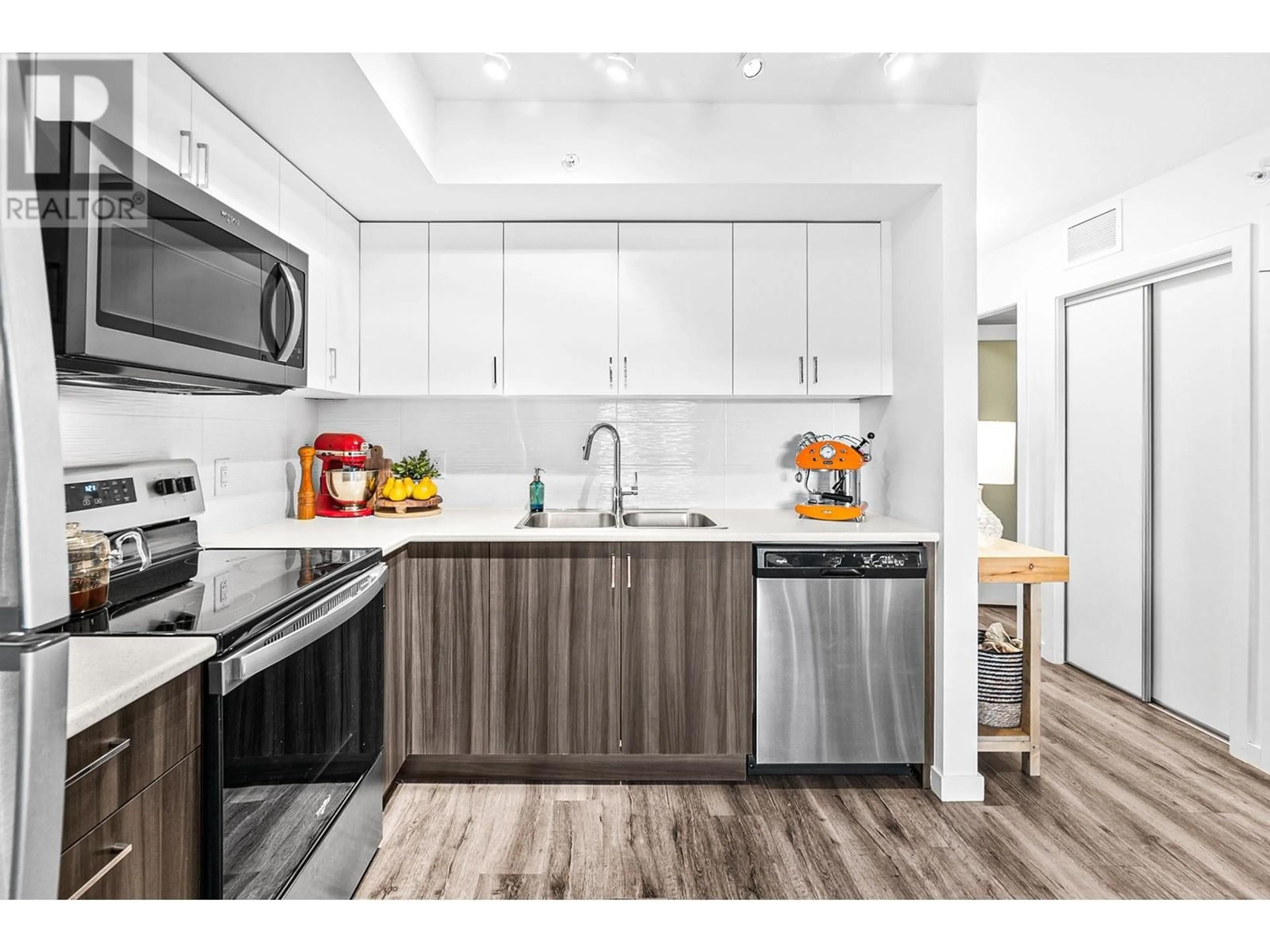 Standard kitchen, wood/laminate floor for PH1 - 625 ACADEMY WAY, Kelowna British Columbia V1V0E3
