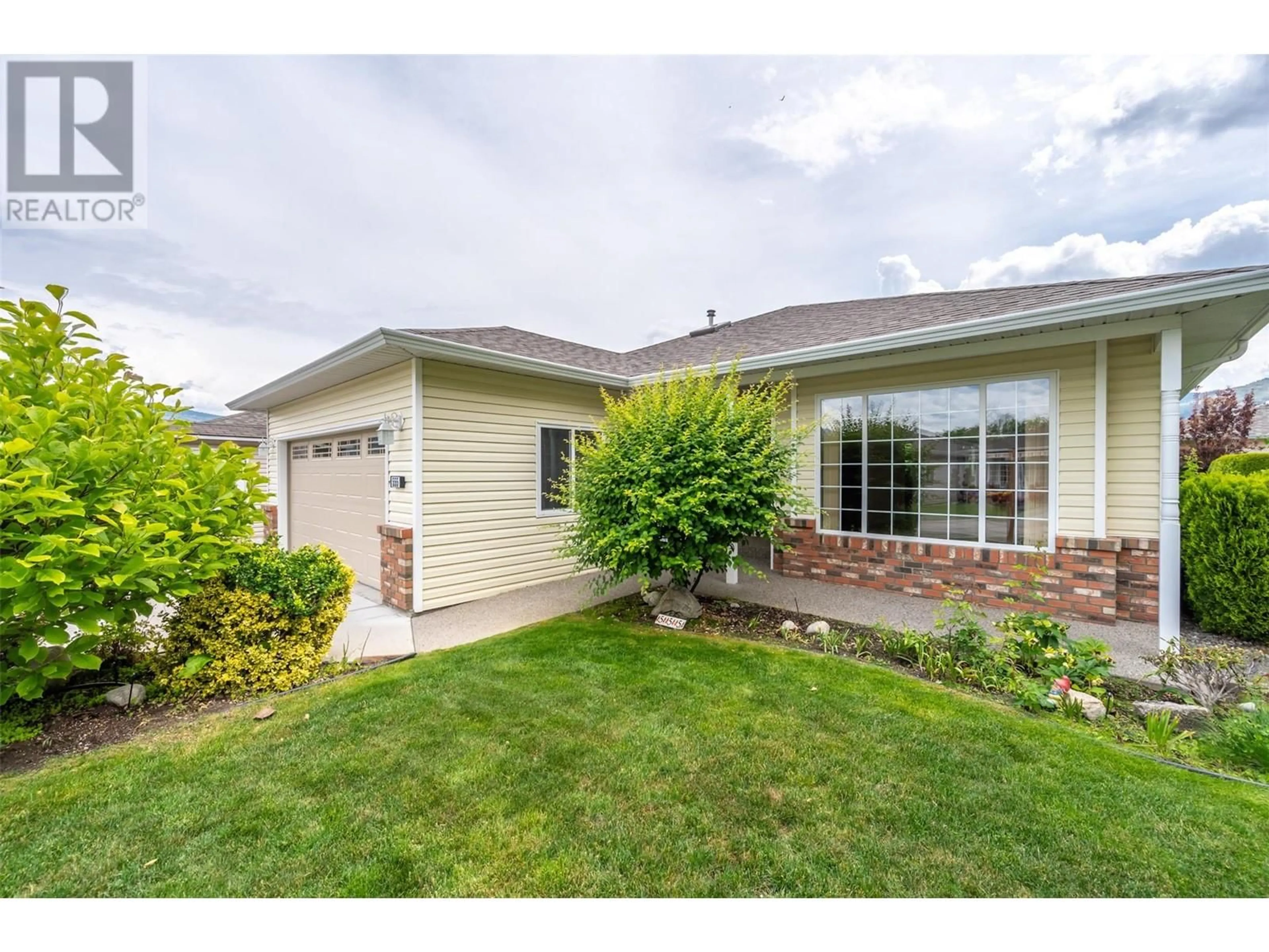Home with vinyl exterior material, unknown for 555 RED WING DRIVE, Penticton British Columbia V2A8K6