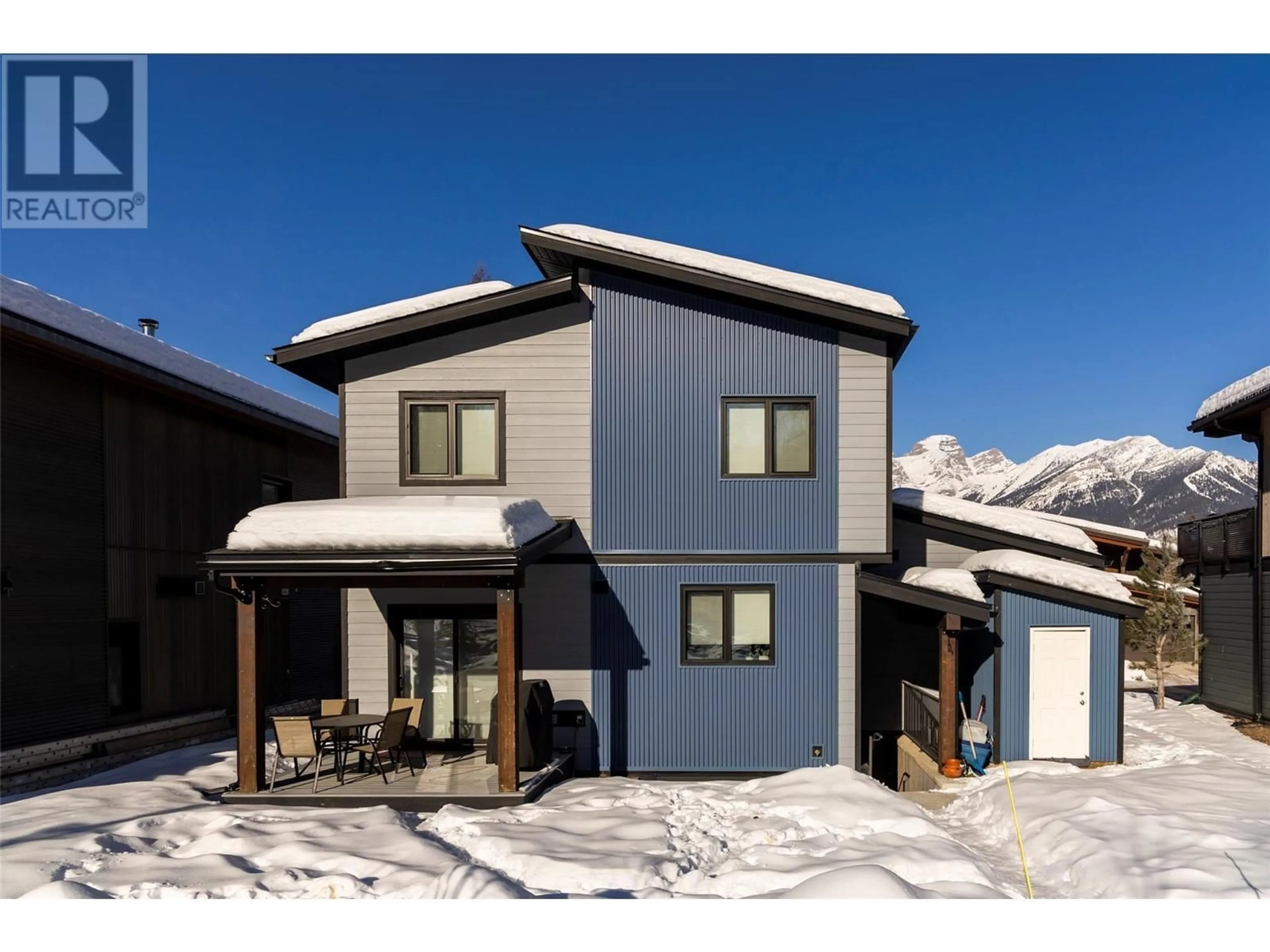 Home with vinyl exterior material, mountain view for 4 Piedmont Drive, Fernie British Columbia V0B1M4