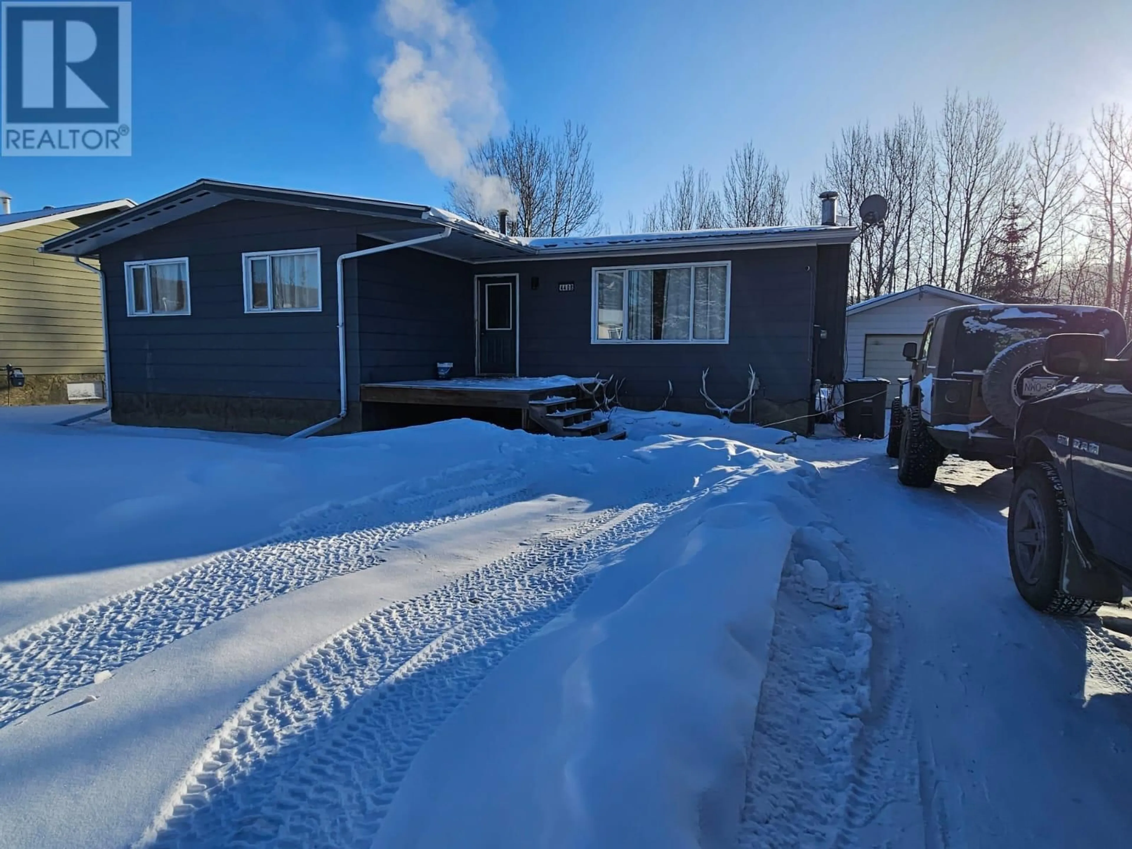 A pic from outside/outdoor area/front of a property/back of a property/a pic from drone, street for 4408 50A NE Avenue, Chetwynd British Columbia V0C1J0