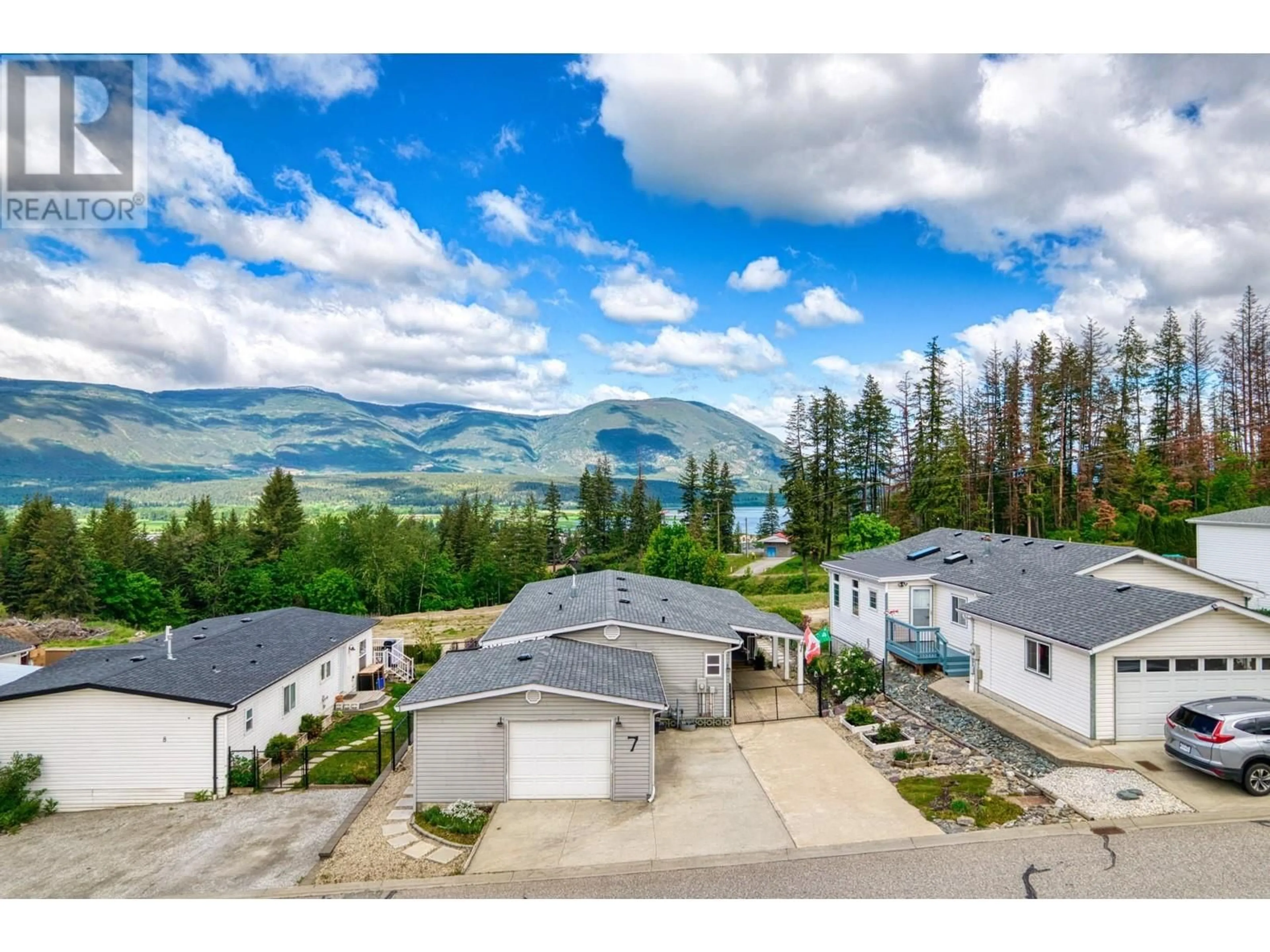 A pic from outside/outdoor area/front of a property/back of a property/a pic from drone, water/lake/river/ocean view for 900 10 Avenue SE Unit# 7, Salmon Arm British Columbia V1E2W6