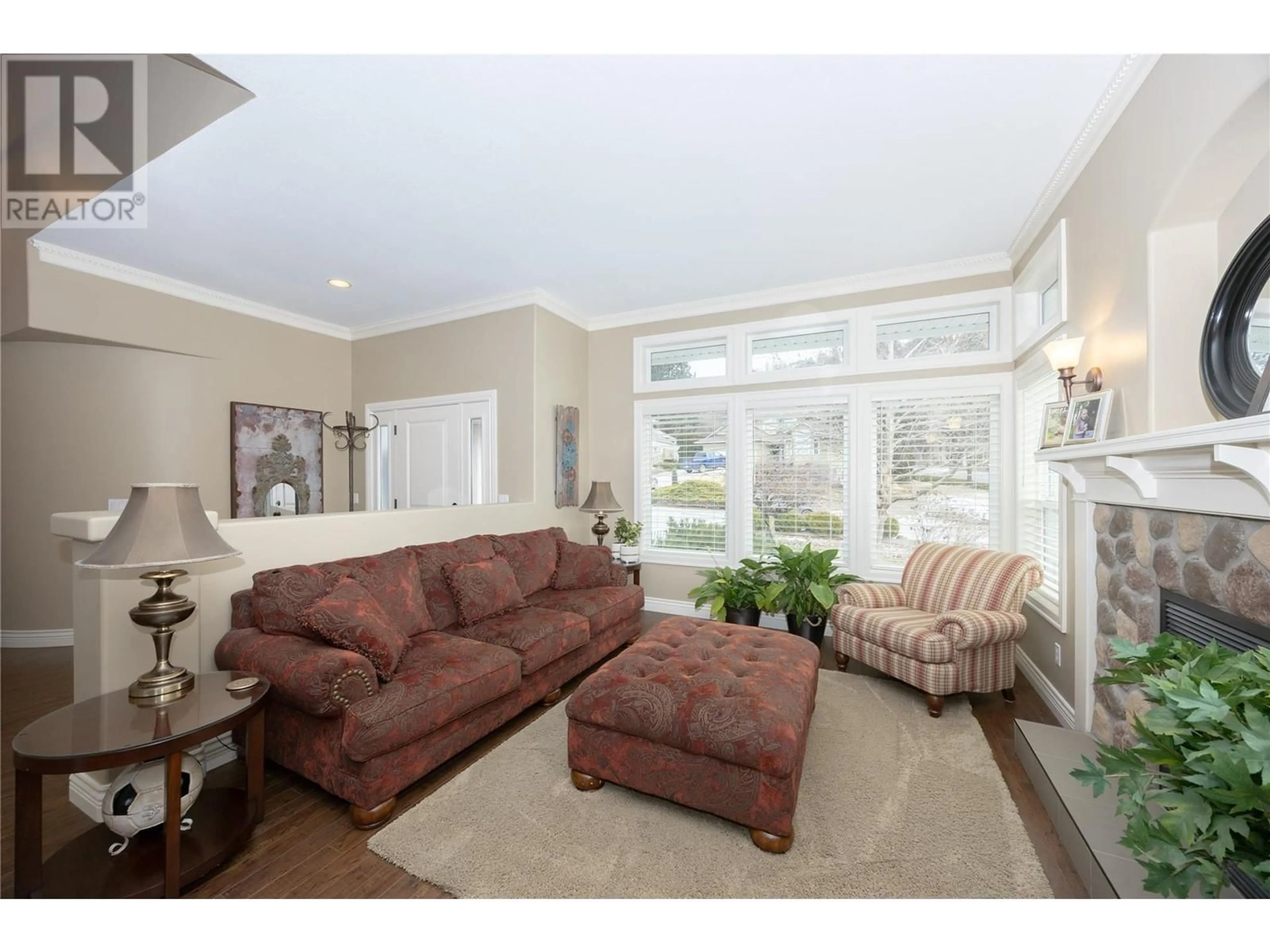 Living room with furniture, unknown for 2094 Lillooet Crescent, Kelowna British Columbia V1V1Y2