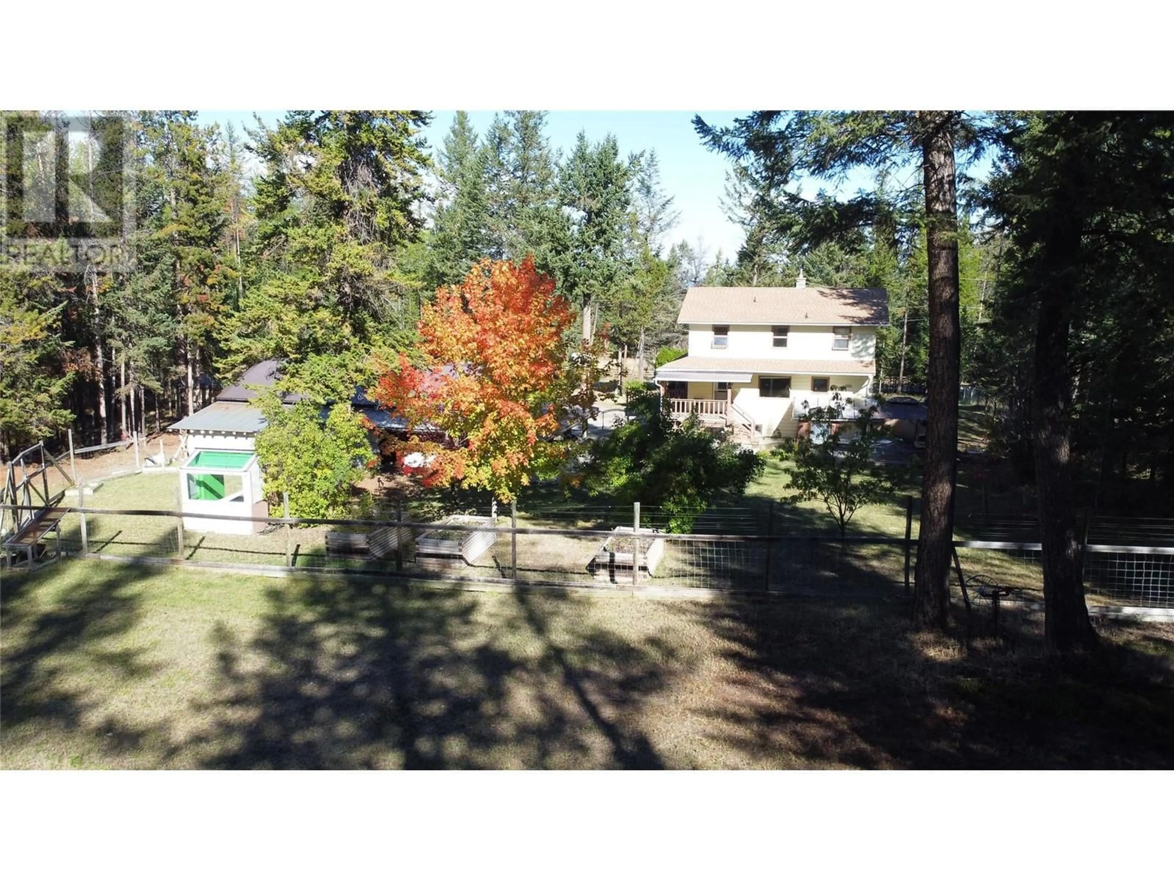 A pic from outside/outdoor area/front of a property/back of a property/a pic from drone, forest/trees view for 3605 53rd Street S, Cranbrook British Columbia V1C7A3