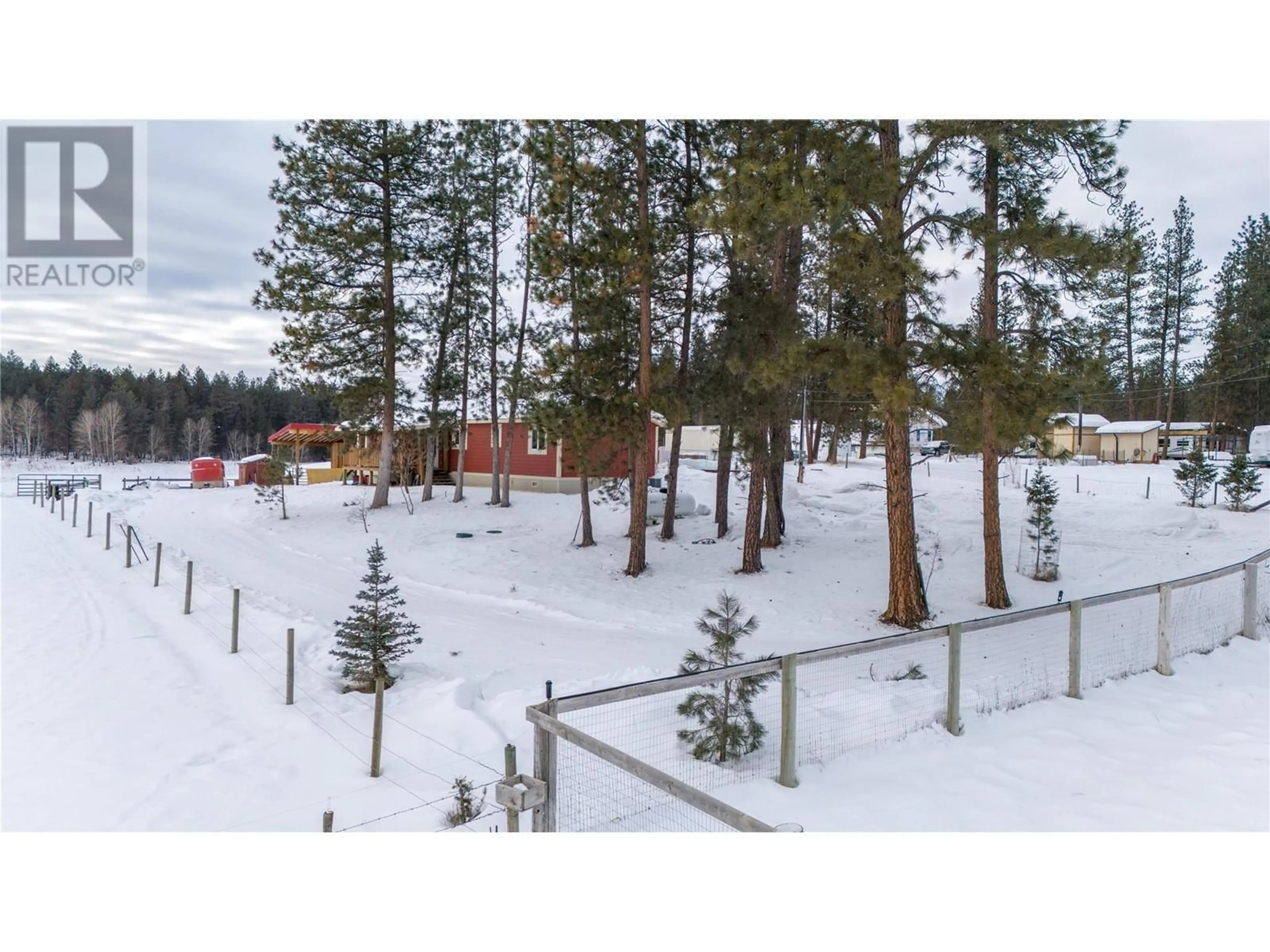 A pic from outside/outdoor area/front of a property/back of a property/a pic from drone, forest/trees view for 501 Chief David Road, Baynes Lake British Columbia V0B1T4