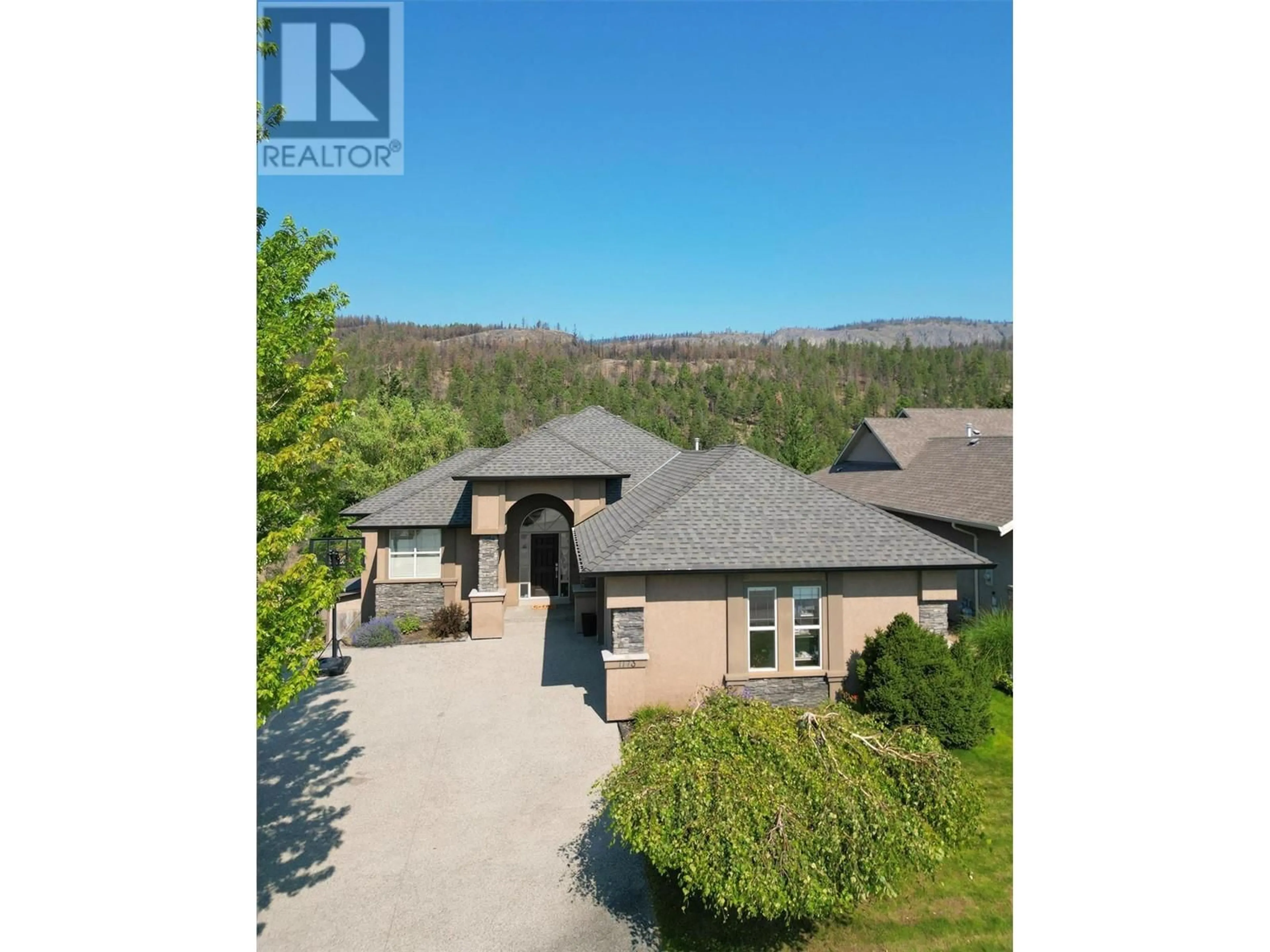 A pic from outside/outdoor area/front of a property/back of a property/a pic from drone, water/lake/river/ocean view for 1173 Peak Point Drive, West Kelowna British Columbia V1Z4A9