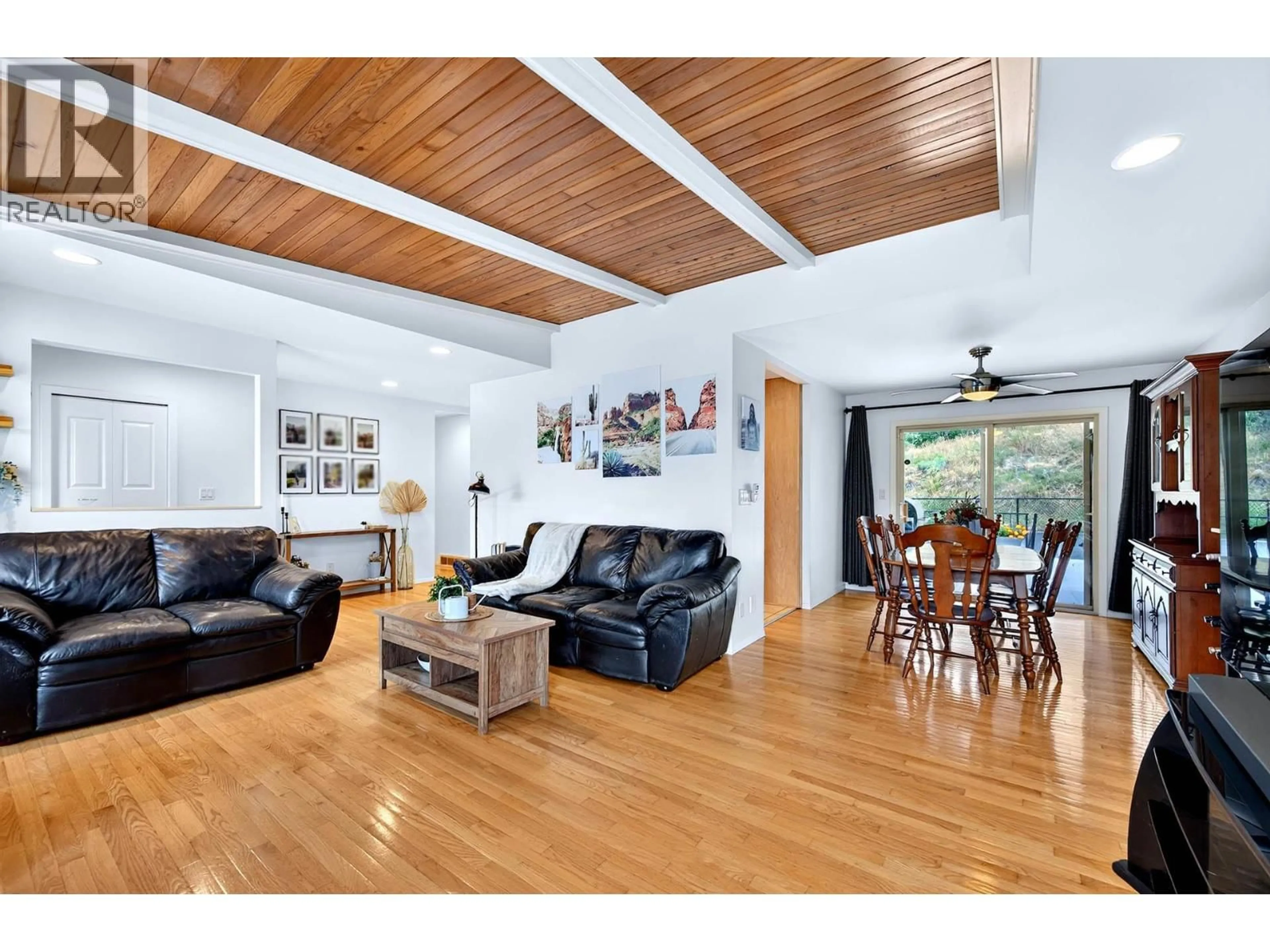 Living room with furniture, wood/laminate floor for 233 MONMOUTH DRIVE, Kamloops British Columbia V2E1L9