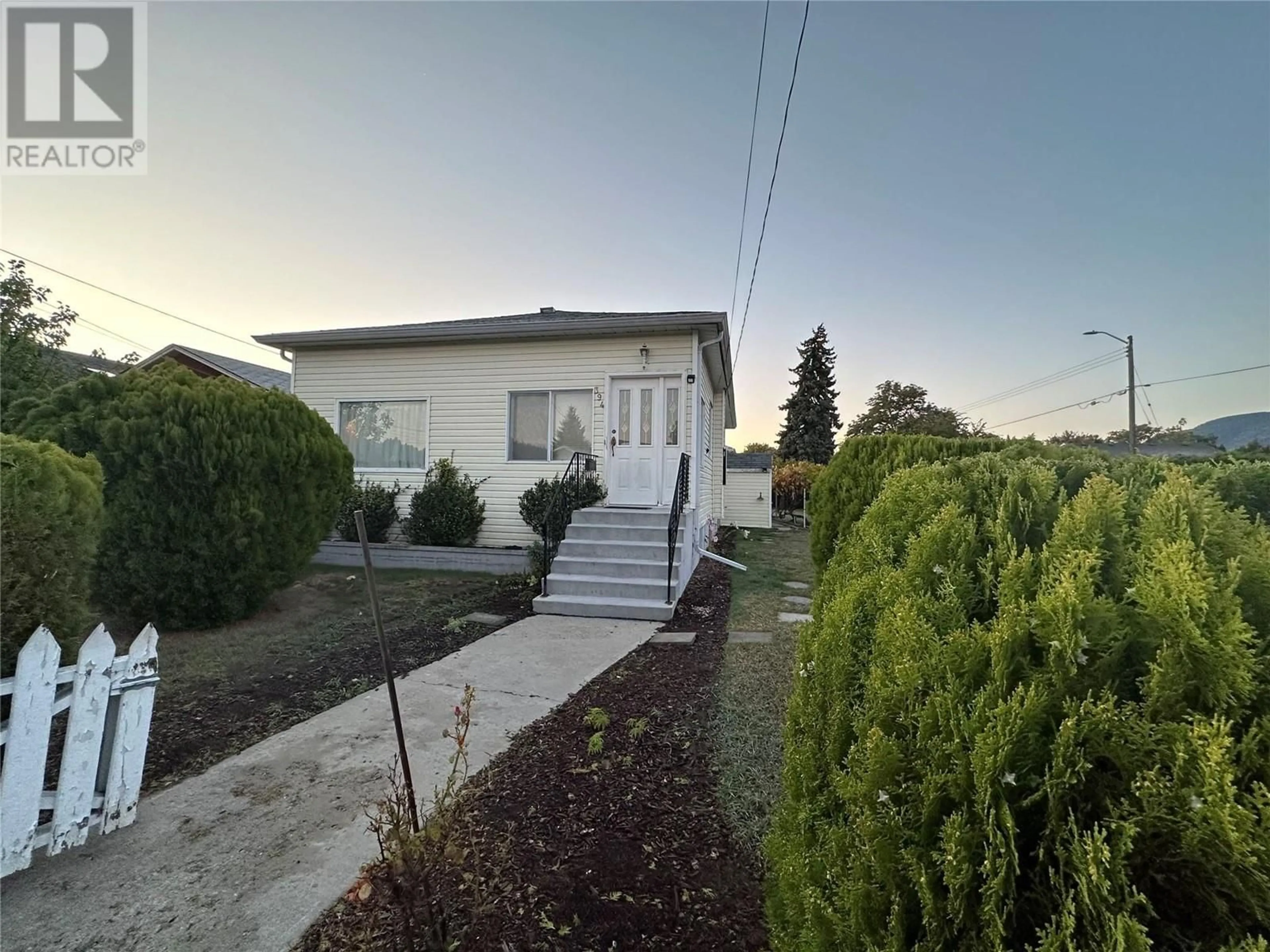 A pic from outside/outdoor area/front of a property/back of a property/a pic from drone, street for 394 WADE Avenue W, Penticton British Columbia V2A1V1