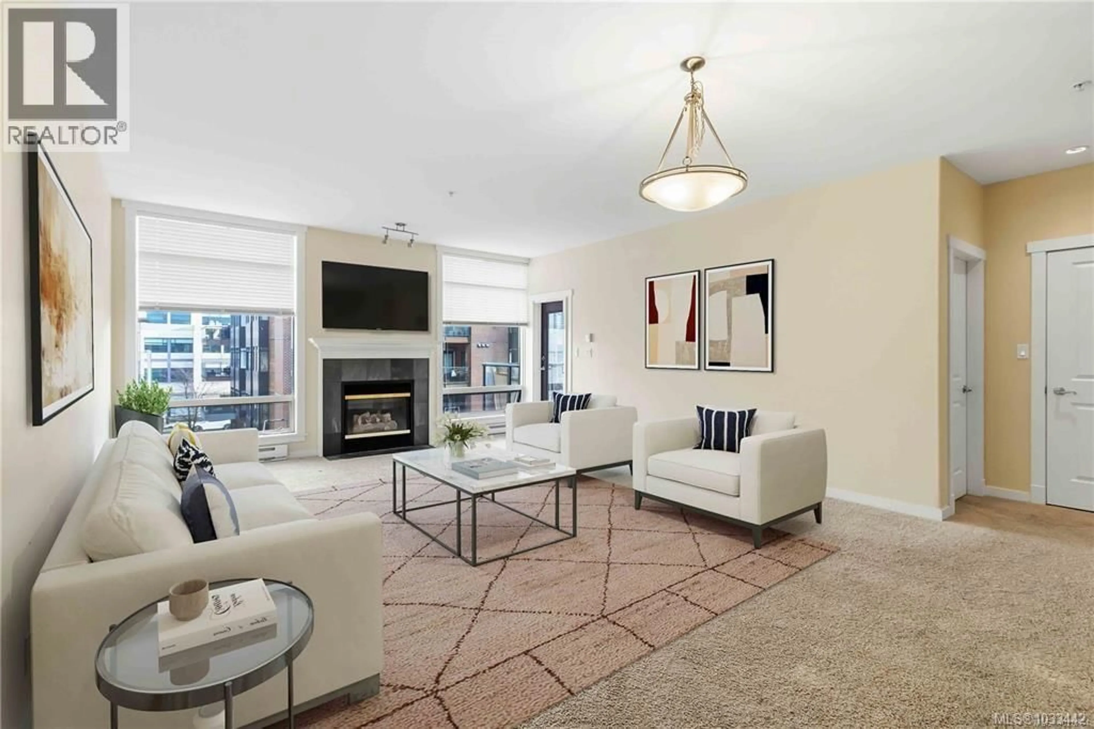 Living room with furniture, unknown for 306 - 330 WATERFRONT CRESCENT, Victoria British Columbia V8T5K3