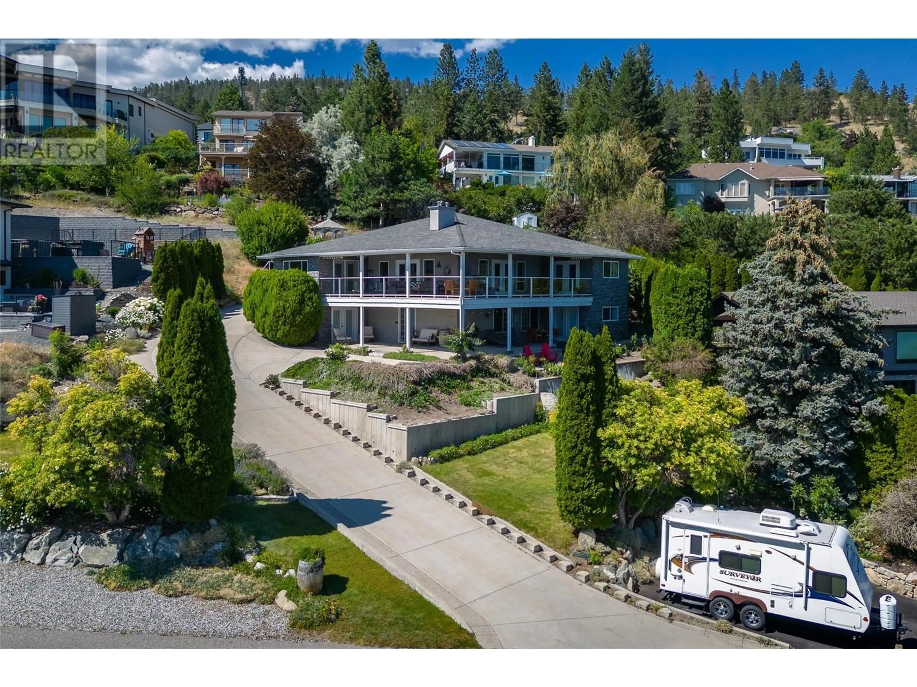 A pic from outside/outdoor area/front of a property/back of a property/a pic from drone, mountain view for 1290 Menu Road, West Kelowna British Columbia V1Z3K2