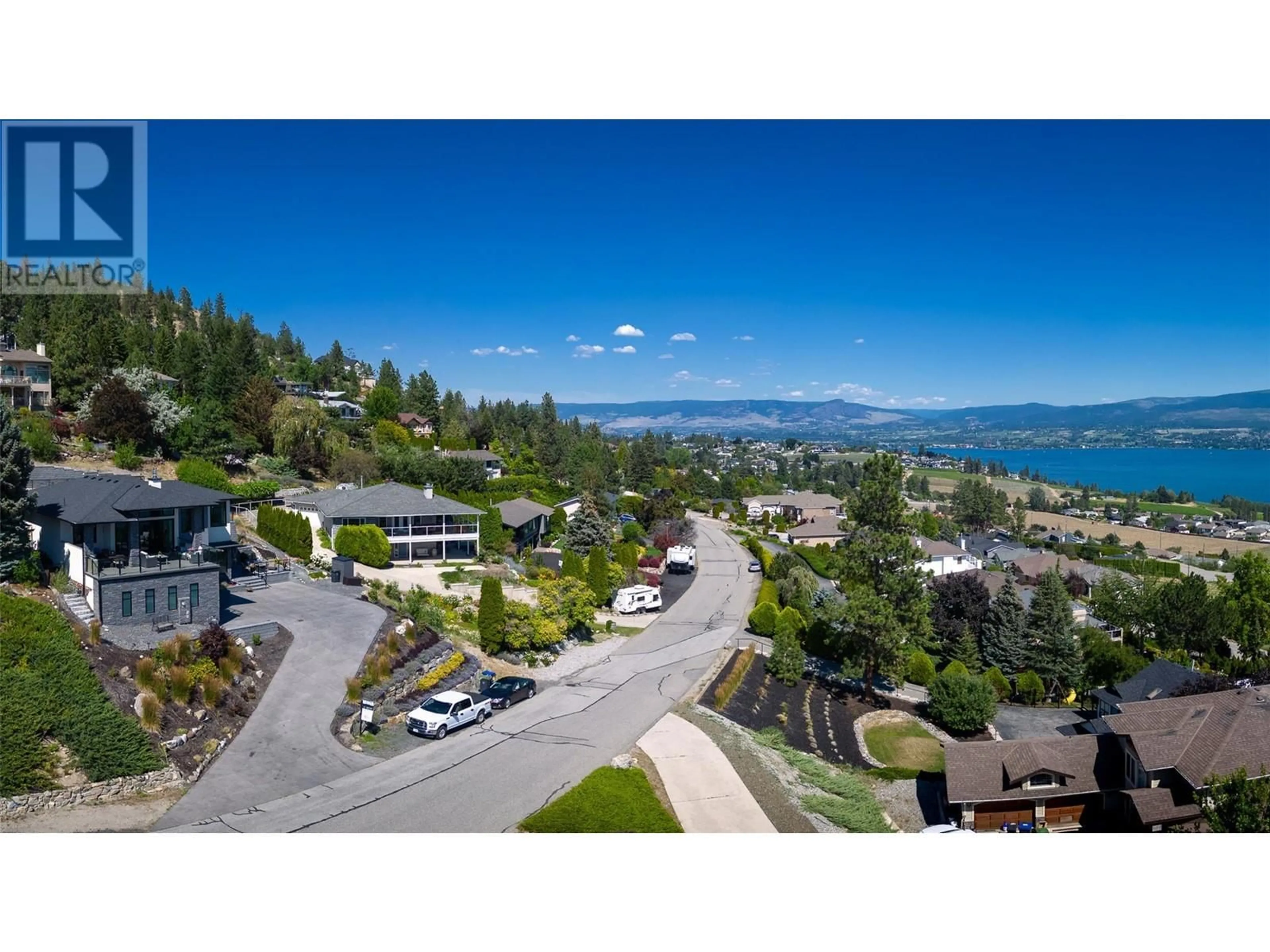 A pic from outside/outdoor area/front of a property/back of a property/a pic from drone, water/lake/river/ocean view for 1290 Menu Road, West Kelowna British Columbia V1Z3K2