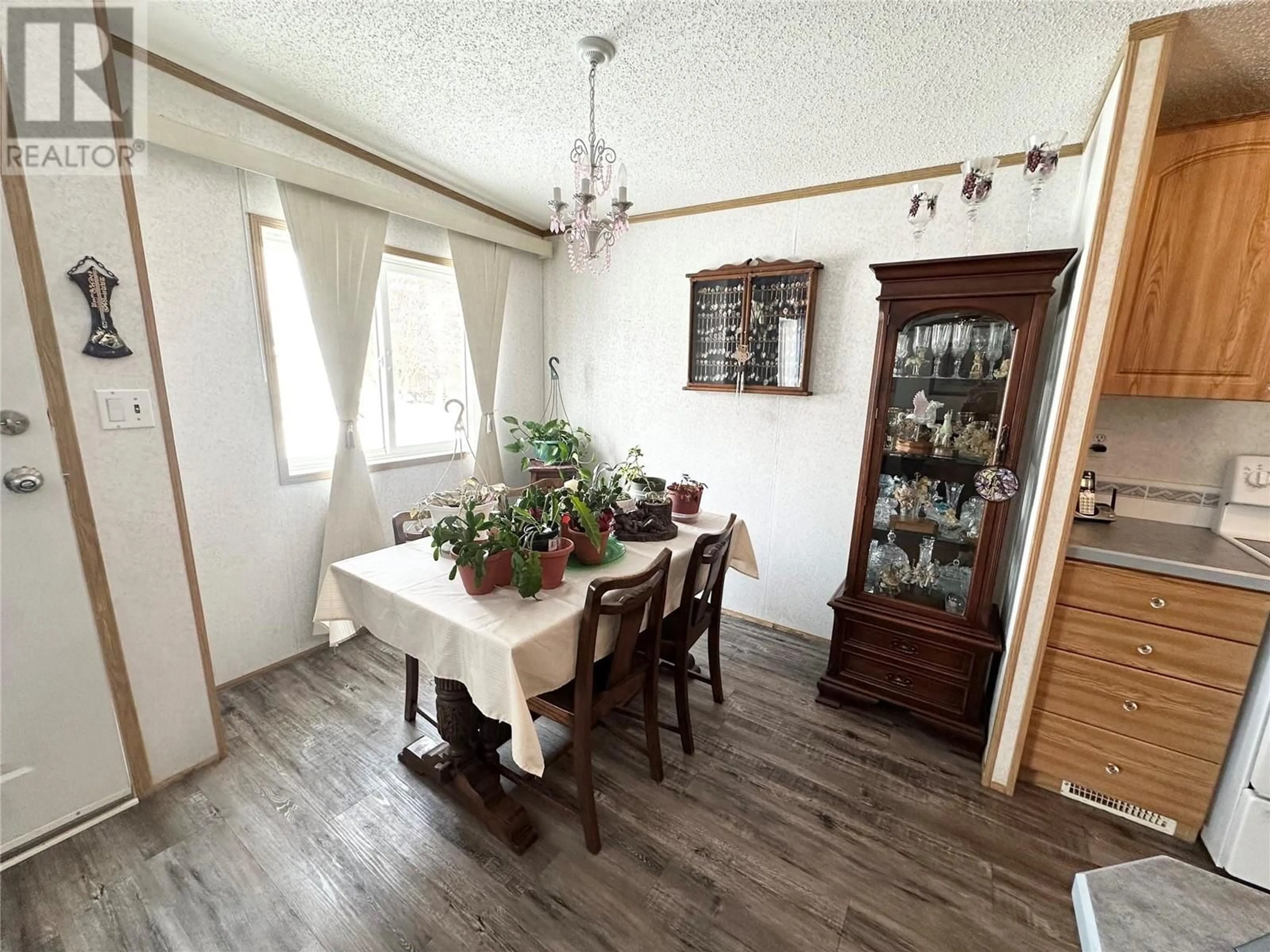 Dining room, wood/laminate floor for 2776 Clapperton Avenue Unit# 61, Merritt British Columbia V1K1G5