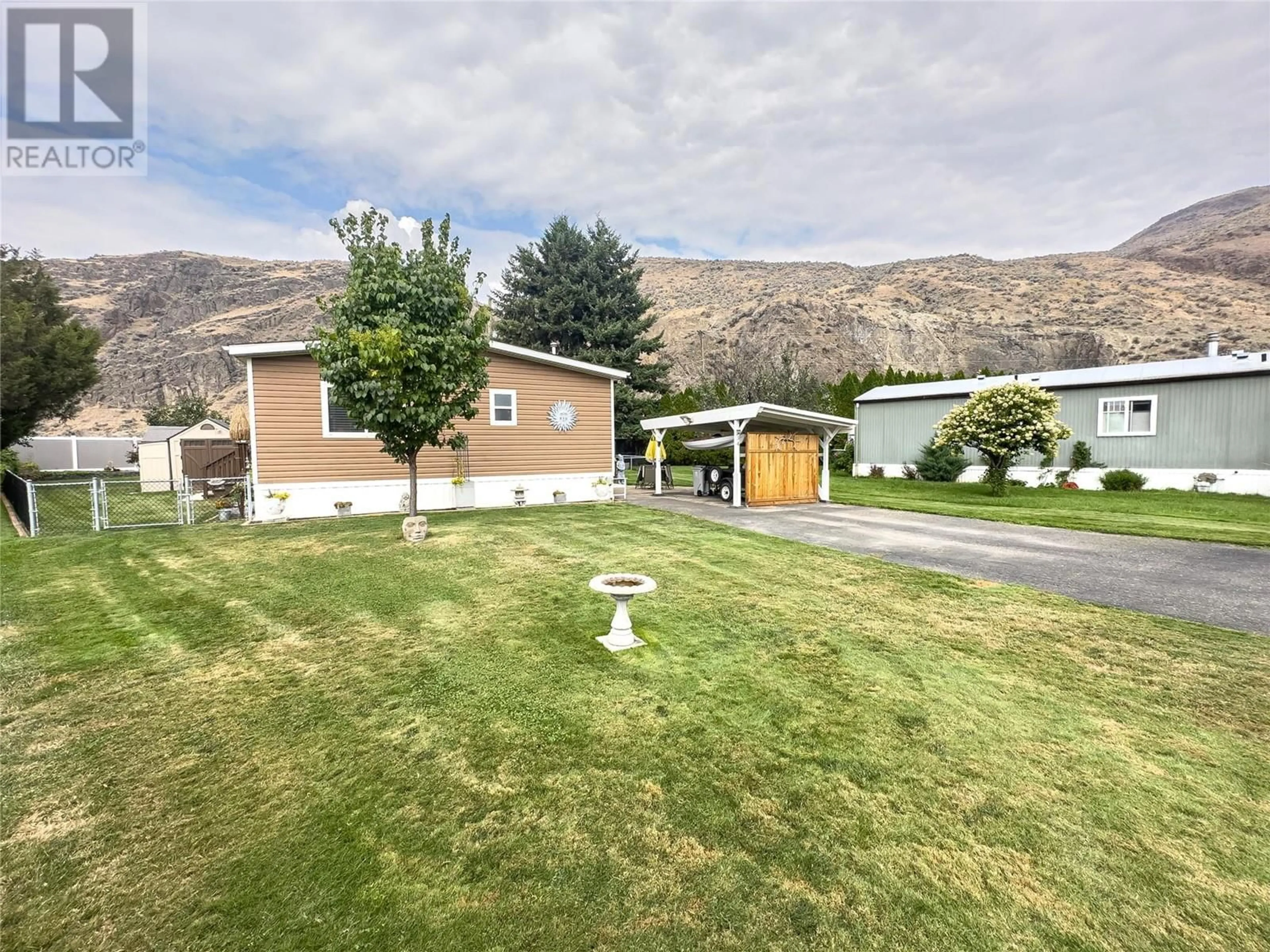 A pic from outside/outdoor area/front of a property/back of a property/a pic from drone, mountain view for 2401 Ord Road Unit# 34, Kamloops British Columbia V2B7V8