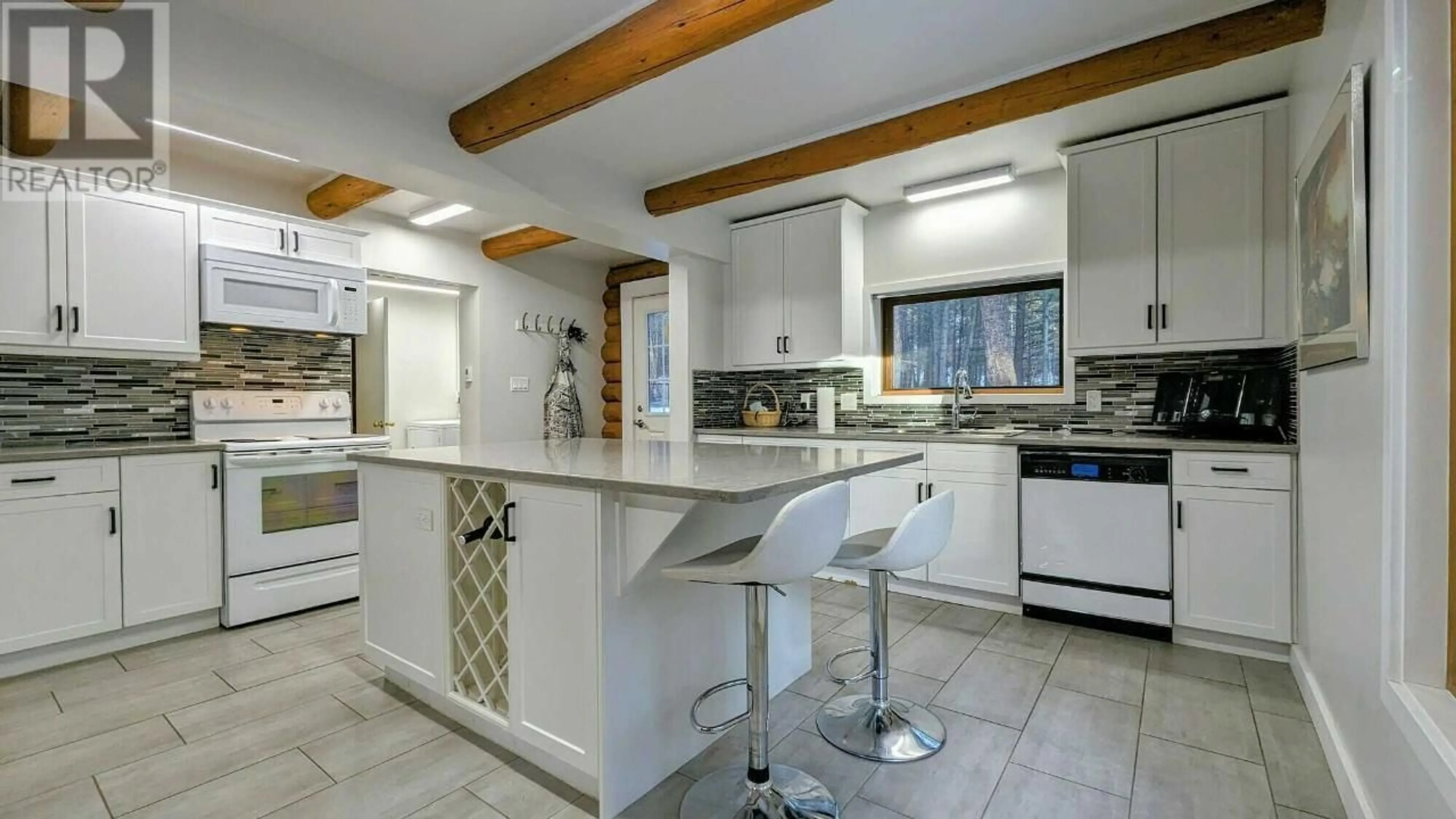 Open concept kitchen, ceramic/tile floor for 6552-6556 MCDONALD LOOP ROAD, Grasmere British Columbia V0B1R0