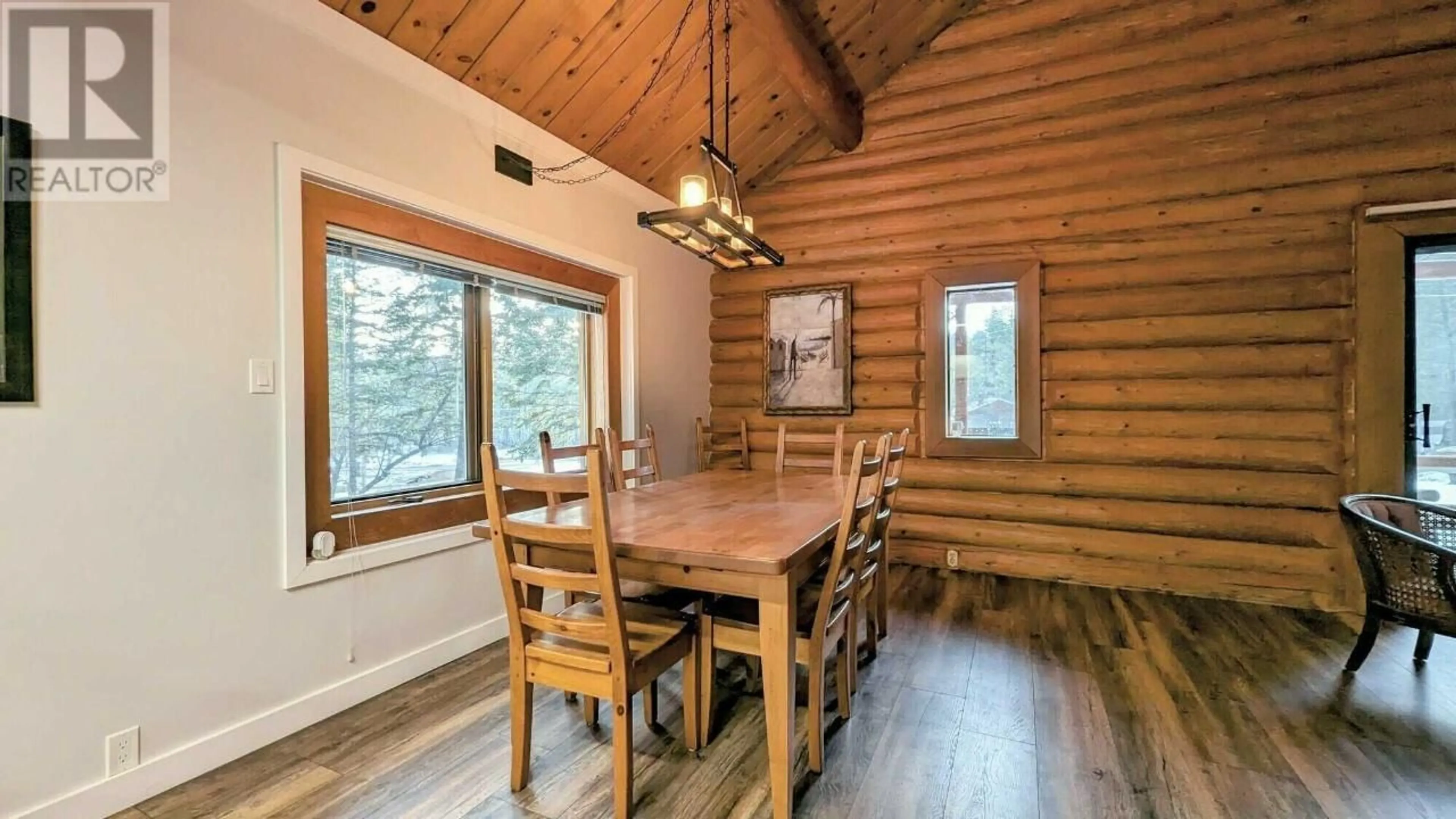 Dining room, wood/laminate floor for 6552-6556 MCDONALD LOOP ROAD, Grasmere British Columbia V0B1R0