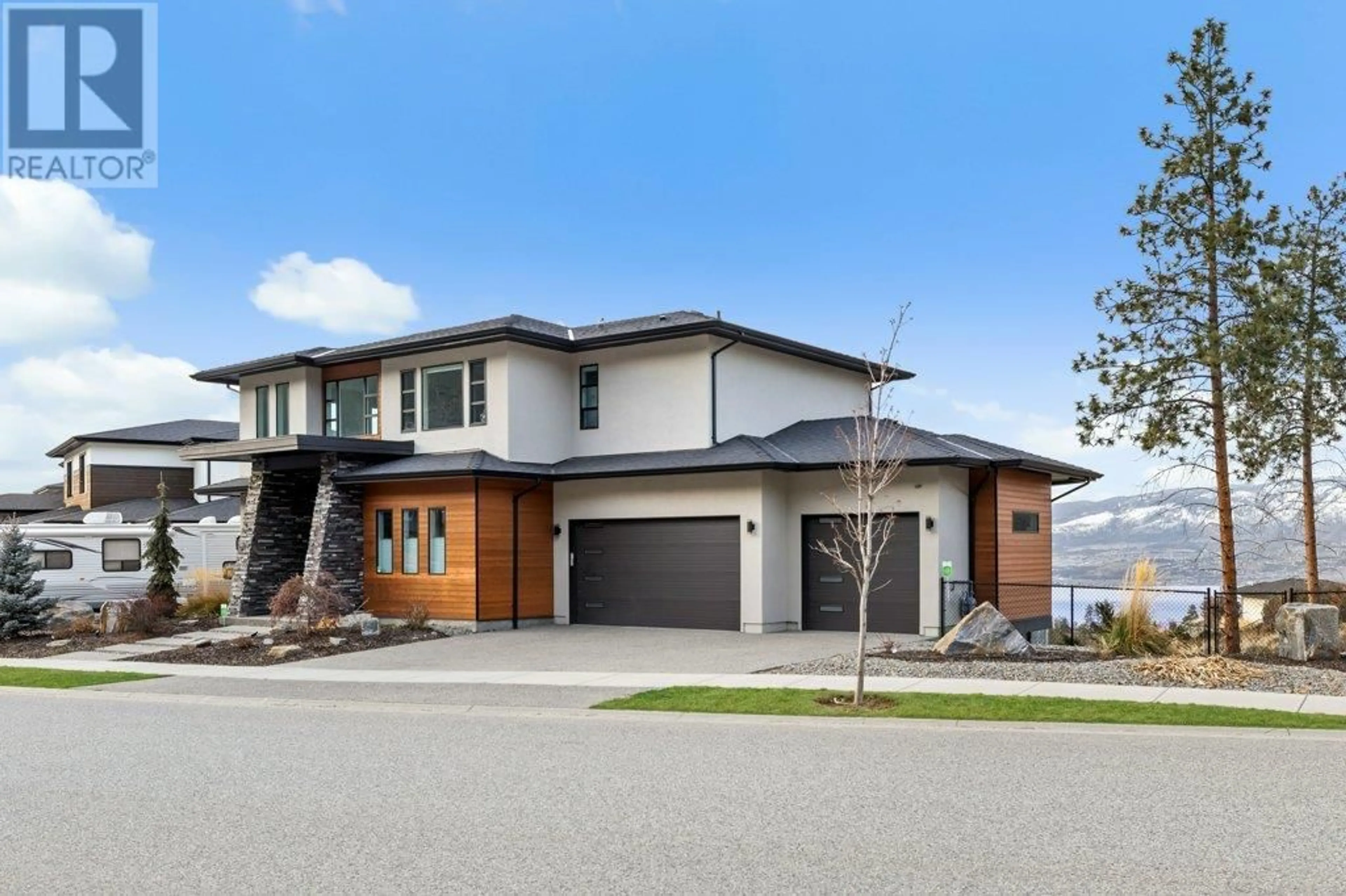 Home with brick exterior material, street for 5624 Mountainside Drive, Kelowna British Columbia V1W5L5