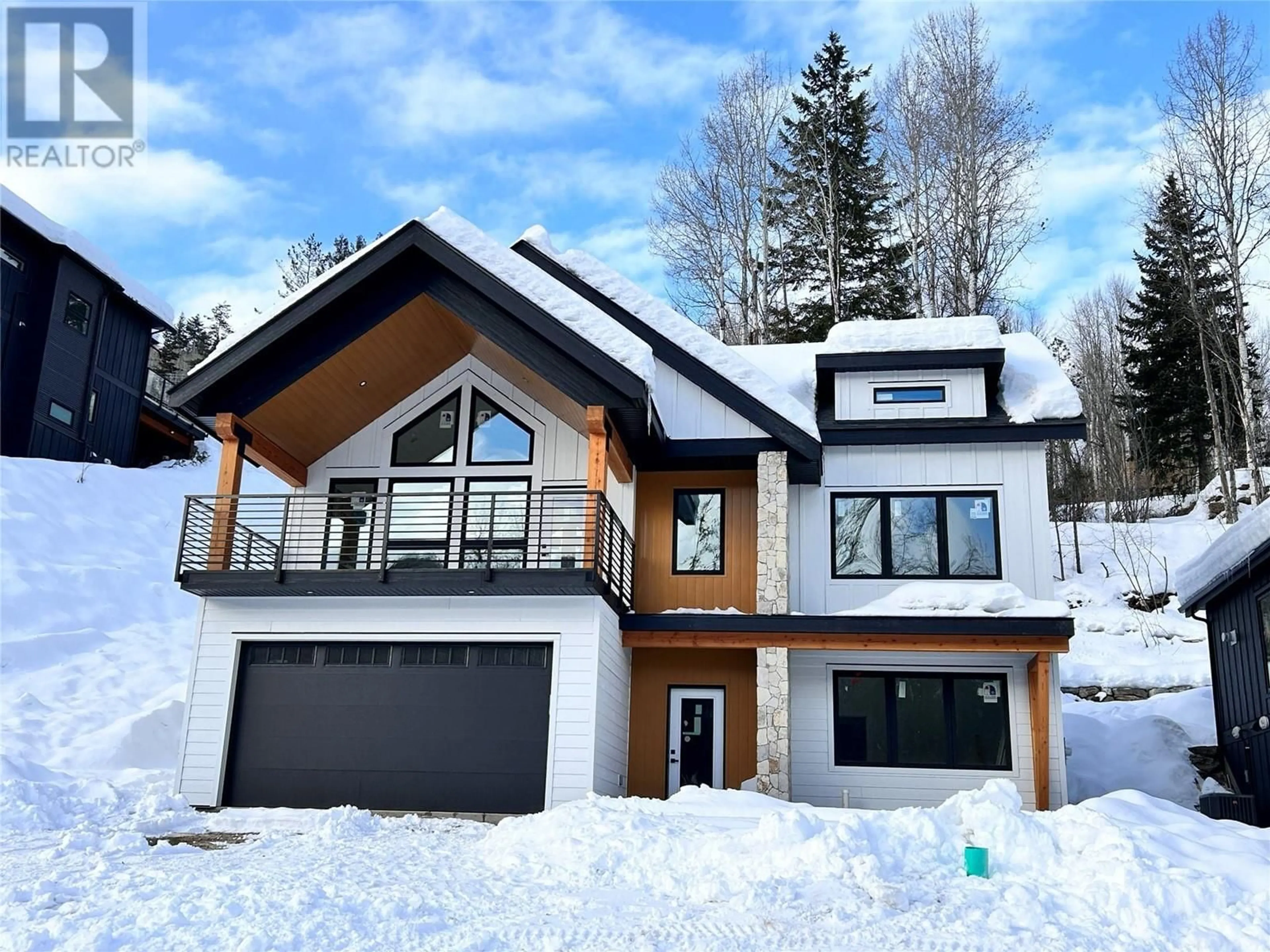 Home with vinyl exterior material, mountain view for 458 COPPER Road, Rossland British Columbia V0G1Y0